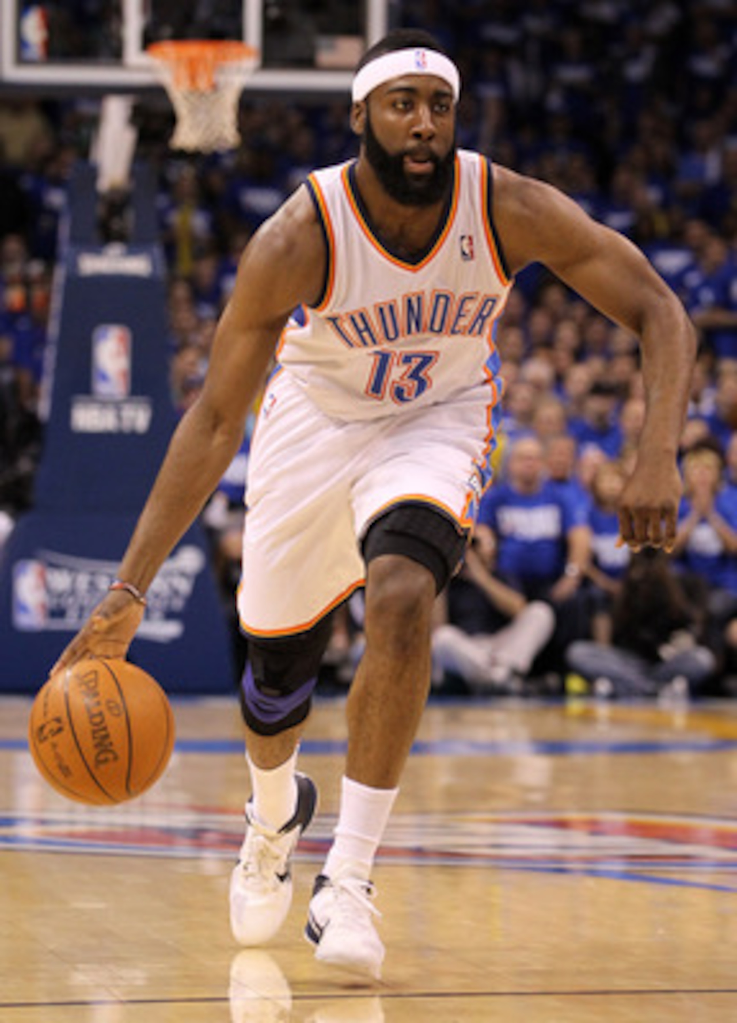 OKLAHOMA CITY, OK - MAY 21:  James Harden #13 of the Oklahoma City Thunder moves the ball while taking on the Dallas Mavericks in Game Three of the Western Conference Finals during the 2011 NBA Playoffs at Oklahoma City Arena on May 21, 2011 in Oklahoma C