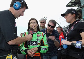 INDIANAPOLIS, IN - MAY 22:  Danica Patrick, driver of the #7 Team GoDaddy Dallara Honda, talks with the media after qualifying for the Indianapolis 500 on May 22, 2011 at Indianapolis Motor Speedway in Indianapolis, Indiana.  (Photo by Jamie Squire/Getty 