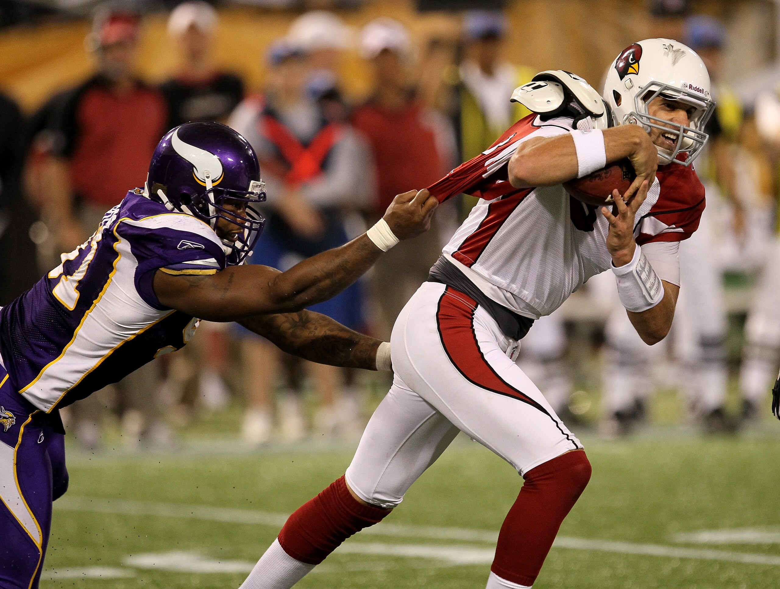 MINNEAPOLIS - NOVEMBER 7: Defensive end Ray Edwards #91 of the Minnesota Vikings grabs the jersey of quarterback Derek Anderson #3 of the Arizona Cardinals at Hubert H. Humphrey Metrodome on November 7, 2010 in Minneapolis, Minnesota. The Vikings won 27- MINNEAPOLIS - NOVEMBER 7: Defensive end Ray Edwards #91 of the Minnesota Vikings grabs the jersey of quarterback Derek Anderson #3 of the Arizona Cardinals at Hubert H. Humphrey Metrodome on November 7, 2010 in Minneapolis, Minnesota. The Vikings won 27-