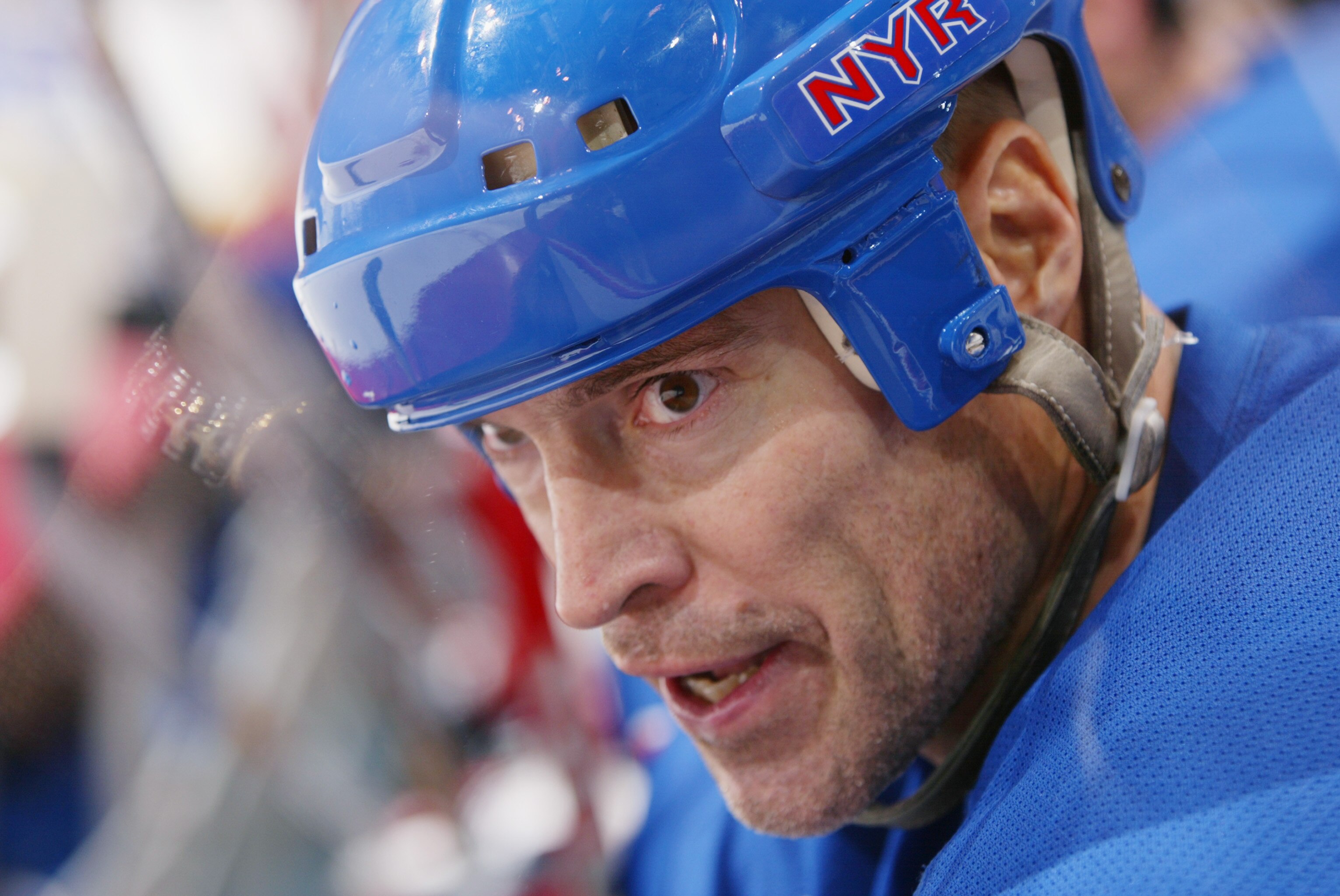VANCOUVER - NOVEMBER 16:  Mark Messier #11 of the New York Rangers looks on from the bench during the game against the Vancouver Canucks at General Motors Place on November 16, 2002 in Vancouver, British Columbia.  The Canucks won 3-1. (Photo by Jeff Vinn