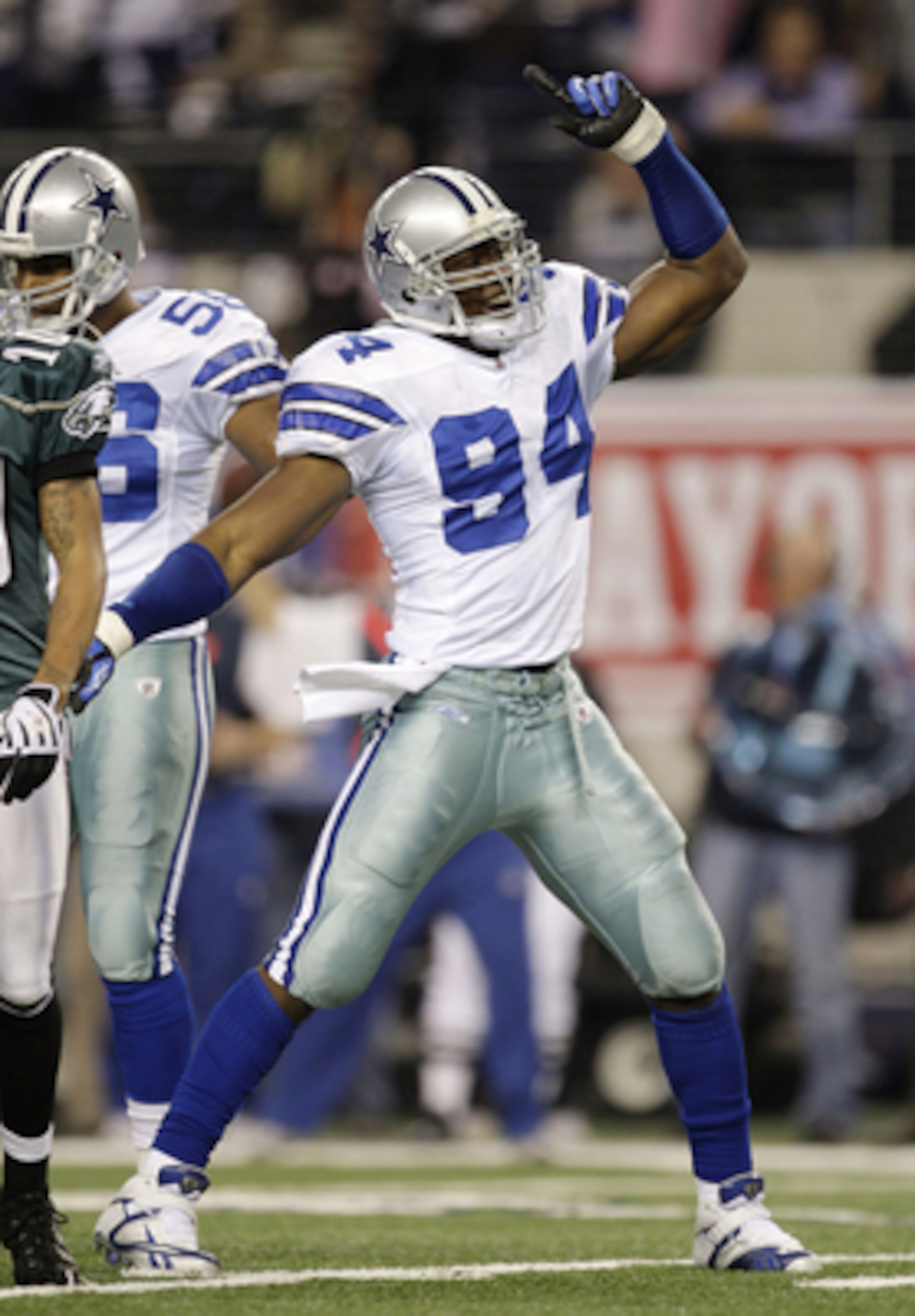 ARLINGTON, TX - JANUARY 9:  DeMarcus Ware #94 of the Dallas Cowboys reacts after the Cowboys recovered a second quarter fumble by Michael Vick #7 of the Philadelphia Eagles during the 2010 NFC wild-card playoff game at Cowboys Stadium on January 9, 2010 i