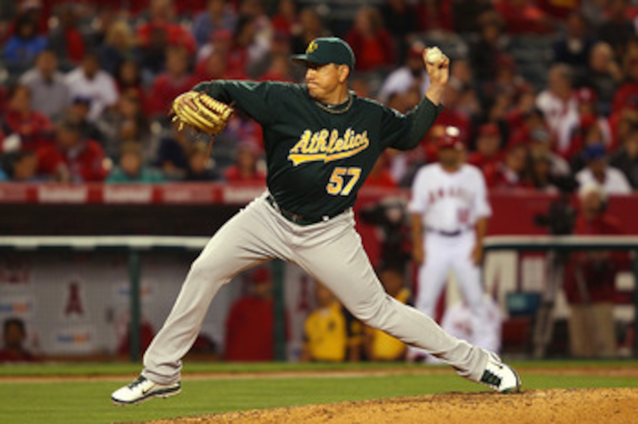ANAHEIM, CA - MAY 23:  Brian Fuentes #57 of the Oakland Athletics pitches against the Los Angeles Angeles of Anaheim in the eighth inning at Angel Stadium on May 23, 2011 in Anaheim, California.  (Photo by Joe Scarnici/Getty Images)