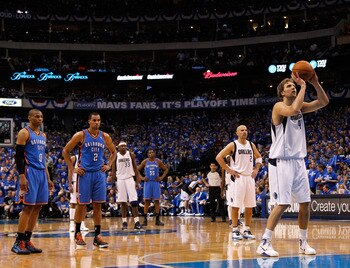 DALLAS, TX - MAY 17:  Dirk Nowitzki #41 of the Dallas Mavericks shoots a free throw after a technical by the Oklahoma City Thunder in Game One of the Western Conference Finals during the 2011 NBA Playoffs at American Airlines Center on May 17, 2011 in Dal