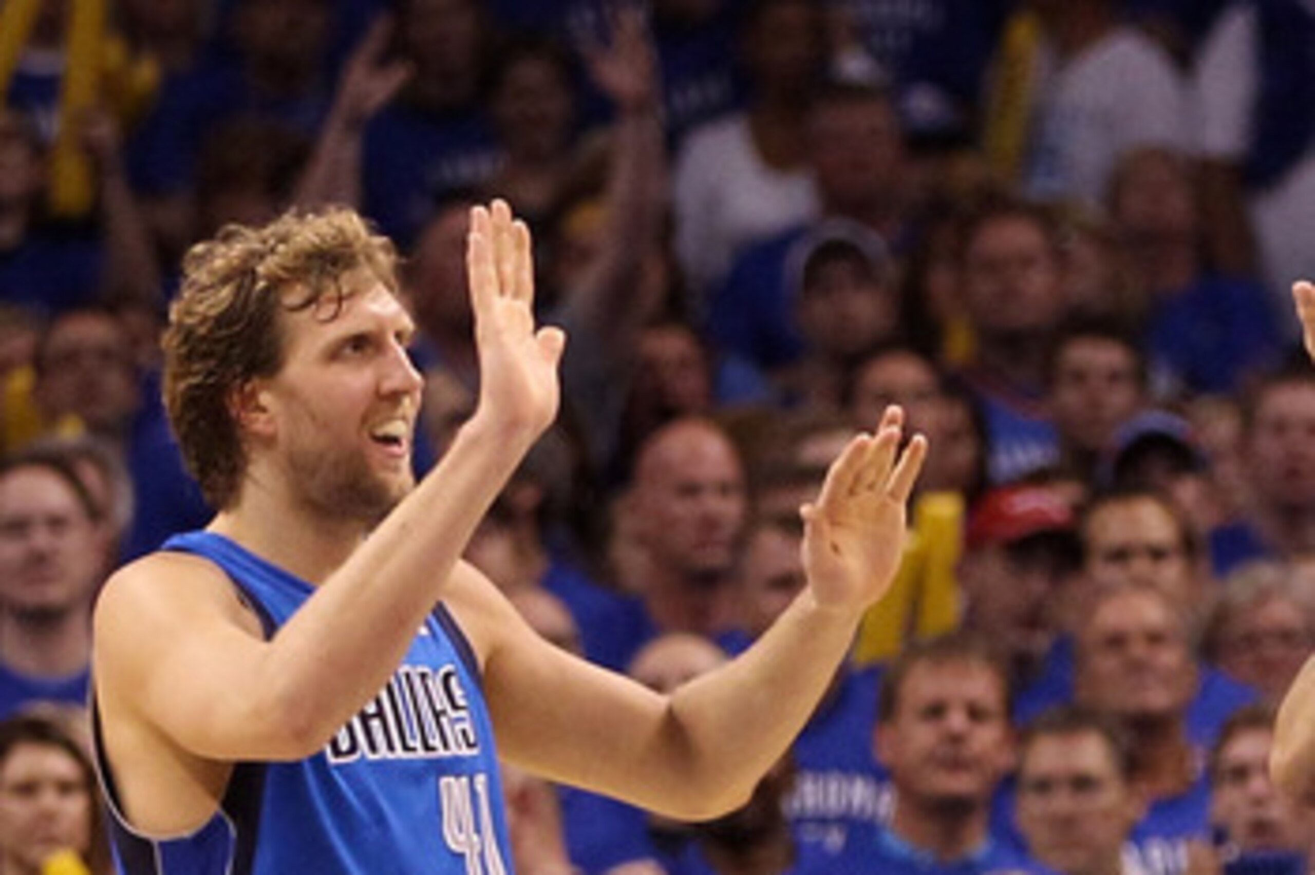 OKLAHOMA CITY, OK - MAY 23:  (L-R) Dirk Nowitzki #41, Jason Kidd #2, Tyson Chandler #6 and Peja Stojakovic #16 of the Dallas Mavericks react in the fourth quarter while taking on the Oklahoma City Thunder in Game Four of the Western Conference Finals duri