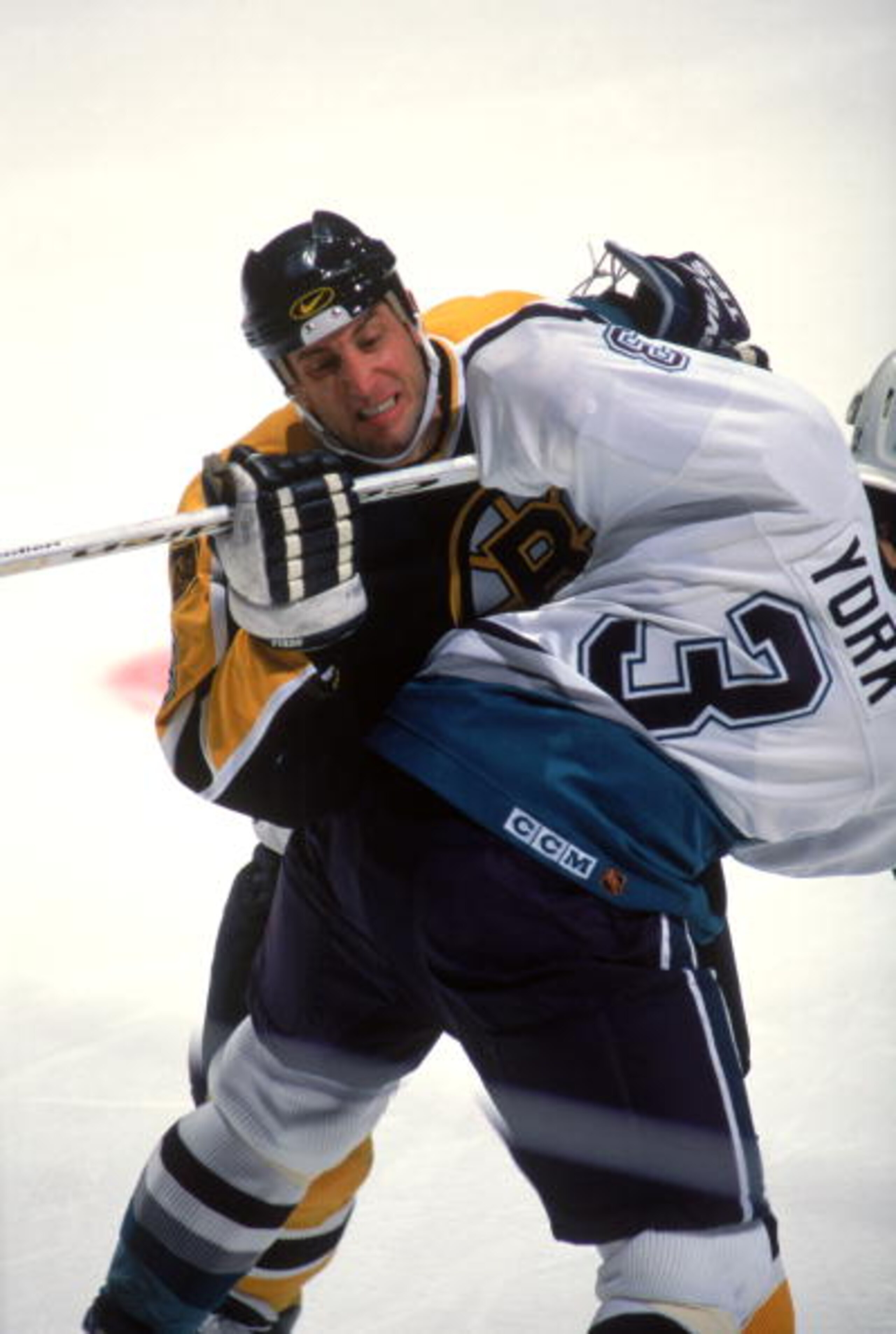 21 Feb 1996: Right-winger Cam Neely of the Boston Bruins and a Anaheim Mighty Ducks player get tangled during a game at Arowhead Pond in Anaheim, California. The Mighty Ducks won the game, 4-3. Mandatory Credit: Glenn Cratty /Allsport 21 Feb 1996: Right-winger Cam Neely of the Boston Bruins and a Anaheim Mighty Ducks player get tangled during a game at Arowhead Pond in Anaheim, California. The Mighty Ducks won the game, 4-3. Mandatory Credit: Glenn Cratty /Allsport