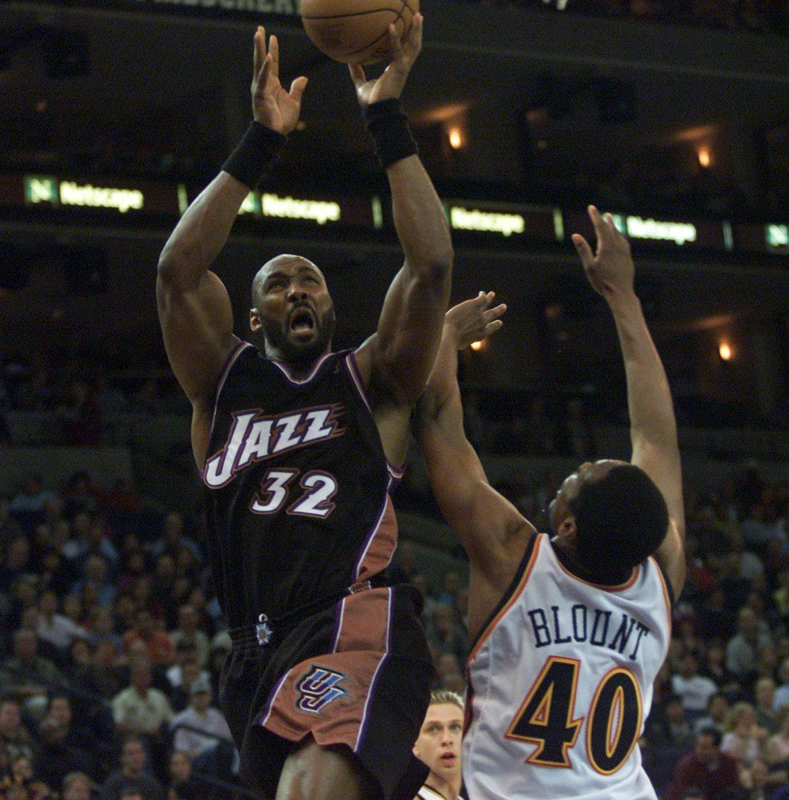 14 Mar 2001:  Forward Karl Malone #32 of the Utah Jazz  drives to the basket against Corie Blount #40 of the Golden State Warriors at the Arena in Oakland, California. DIGITAL IMAGE Mandatory Credit: Tom Hauck/ALLSPORT NOTE TO USER: It is expressly unders