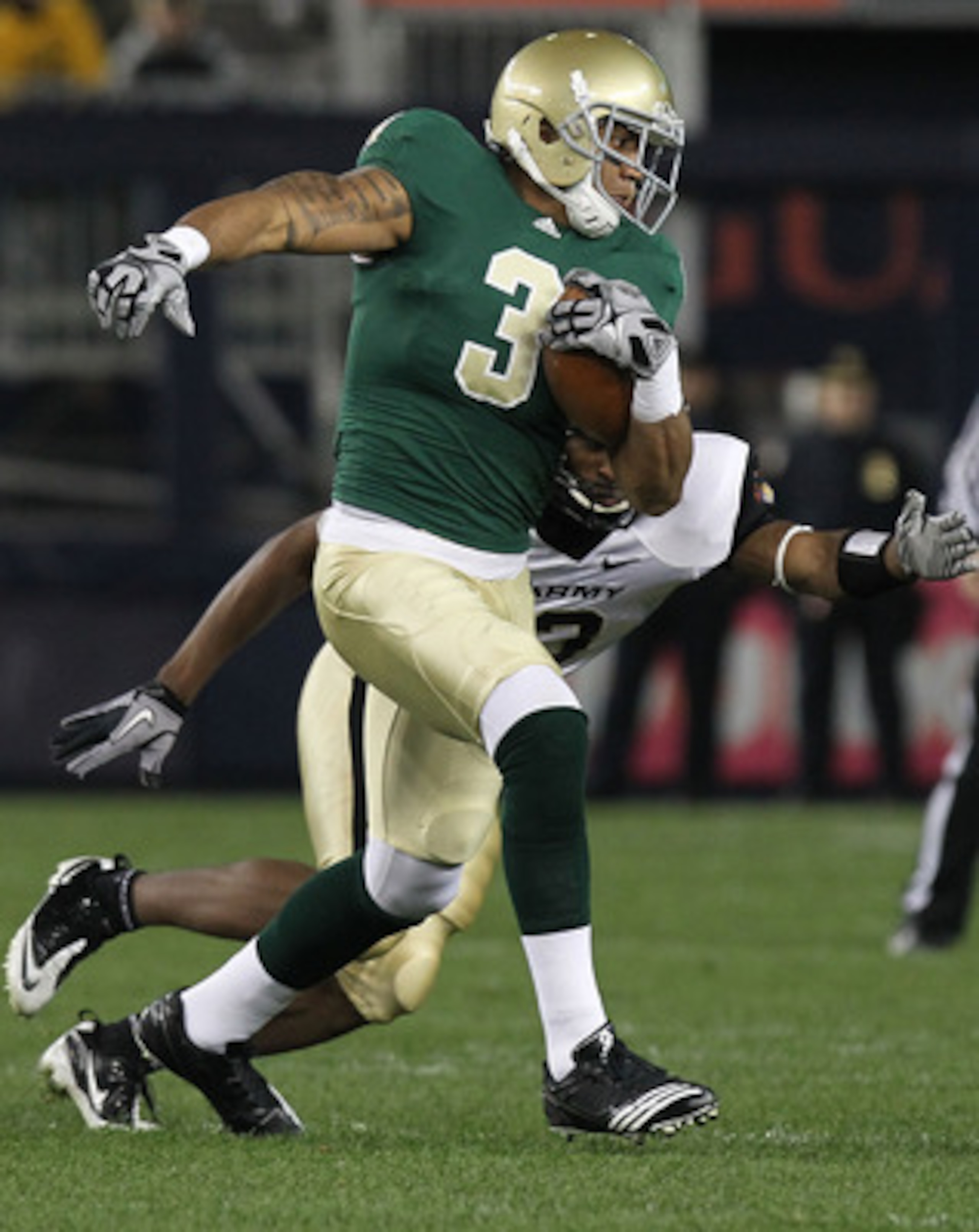 NEW YORK - NOVEMBER 20: Michael Floyd #3 of the Notre Dame Fighting Irish rushes against the Army Black Knights at Yankee Stadium on November 20, 2010 in the Bronx borough of New York City.  (Photo by Nick Laham/Getty Images)