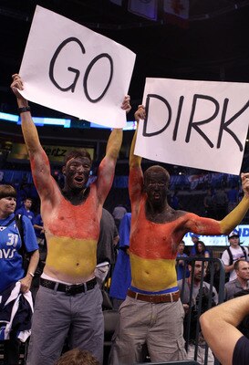 OKLAHOMA CITY, OK - MAY 23:  Fans of Dirk Nowitzki #41 of the Dallas Mavericks hold up signs after the Mavericks 112-105 victory against the Oklahoma City Thunder in Game Four of the Western Conference Finals during the 2011 NBA Playoffs at Oklahoma City 