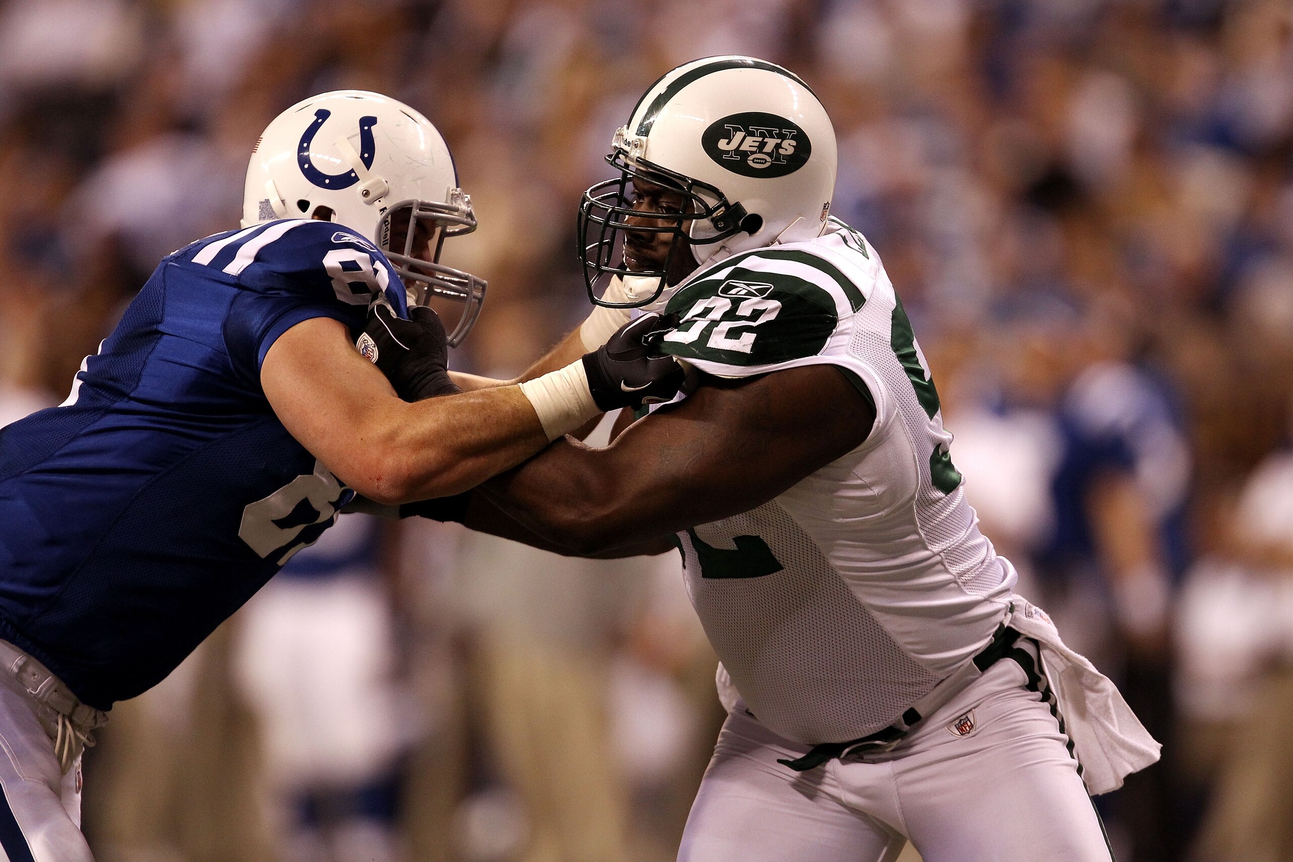 INDIANAPOLIS, IN - JANUARY 08: Defensive end Shaun Ellis #92 of the New York Jets rushes the passer against Bobby Eldridge #81 of the Indianapolis Colts during their 2011 AFC wild card playoff game at Lucas Oil Stadium on January 8, 2011 in Indianapolis, INDIANAPOLIS, IN - JANUARY 08: Defensive end Shaun Ellis #92 of the New York Jets rushes the passer against Bobby Eldridge #81 of the Indianapolis Colts during their 2011 AFC wild card playoff game at Lucas Oil Stadium on January 8, 2011 in Indianapolis,