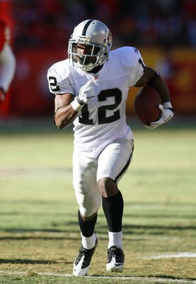 KANSAS CITY, MO - JANUARY 02:  Wide receiver Jacoby Ford #12 of the Oakland Raiders runs down field in a game against the Kansas City Chiefs at Arrowhead Stadium on January 2, 2011 in Kansas City, Missouri.  (Photo by Tim Umphrey/Getty Images)