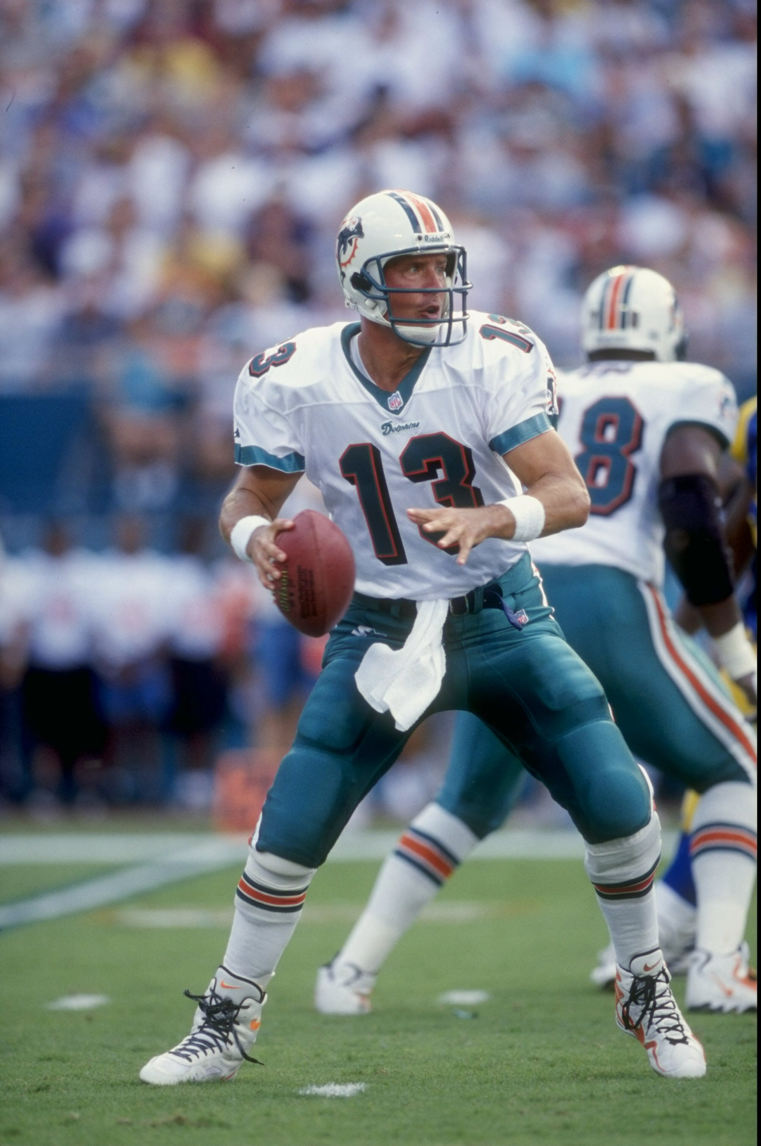 18 Oct 1998: Quarterback Dan Marino #13 of the Miami Dolphins looks to throw during a game against the St. Louis Rams at Pro Player Stadium in Miami, Florida. The Dolphins defeated the Rams 14-0. Mandatory Credit: Andy Lyons  /Allsport