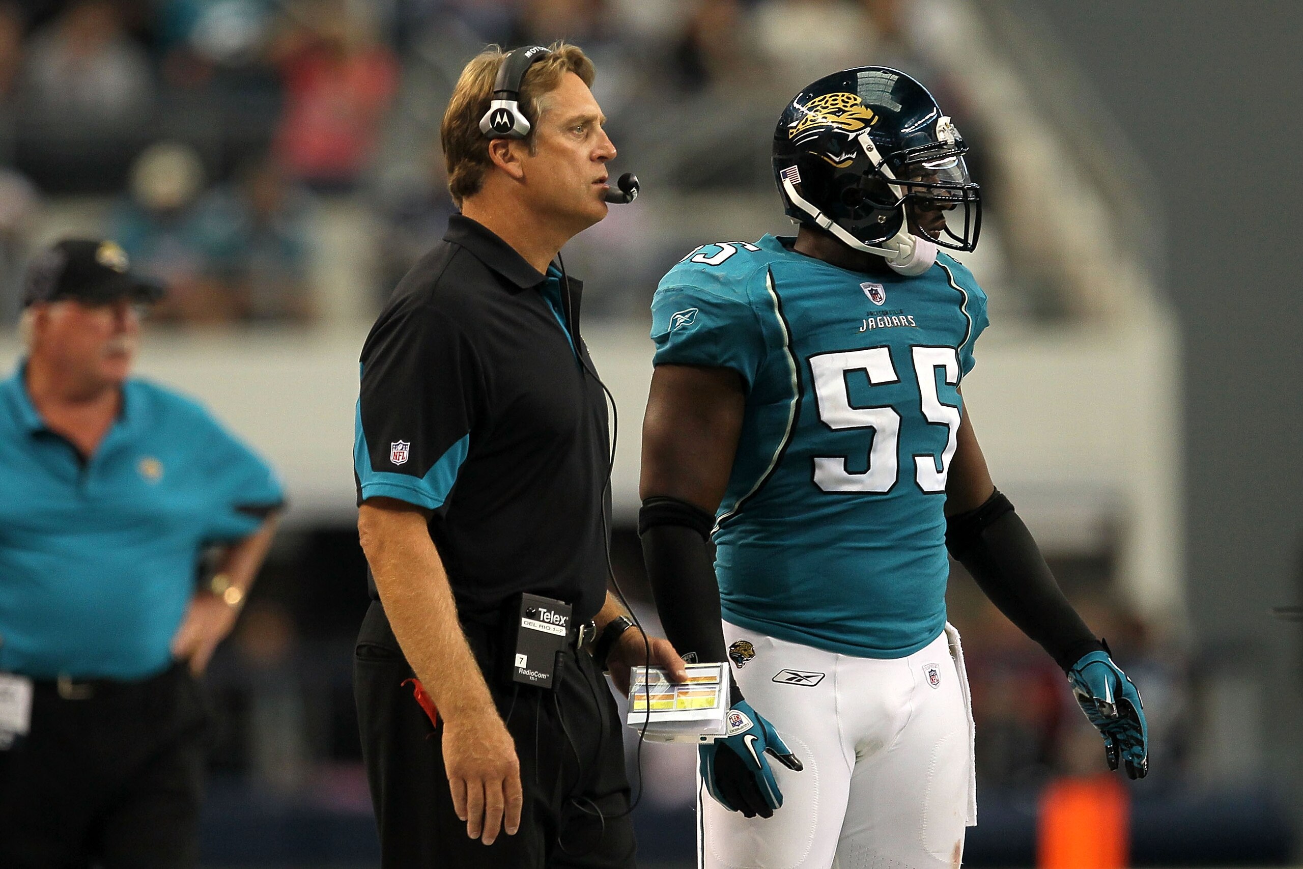 ARLINGTON, TX - OCTOBER 31:  Head coach Jack Del Rio and Kirk Morrison #55 of the Jacksonville Jaguars look on from the sideline against the Dallas Cowboys at Cowboys Stadium on October 31, 2010 in Arlington, Texas.  (Photo by Stephen Dunn/Getty Images)