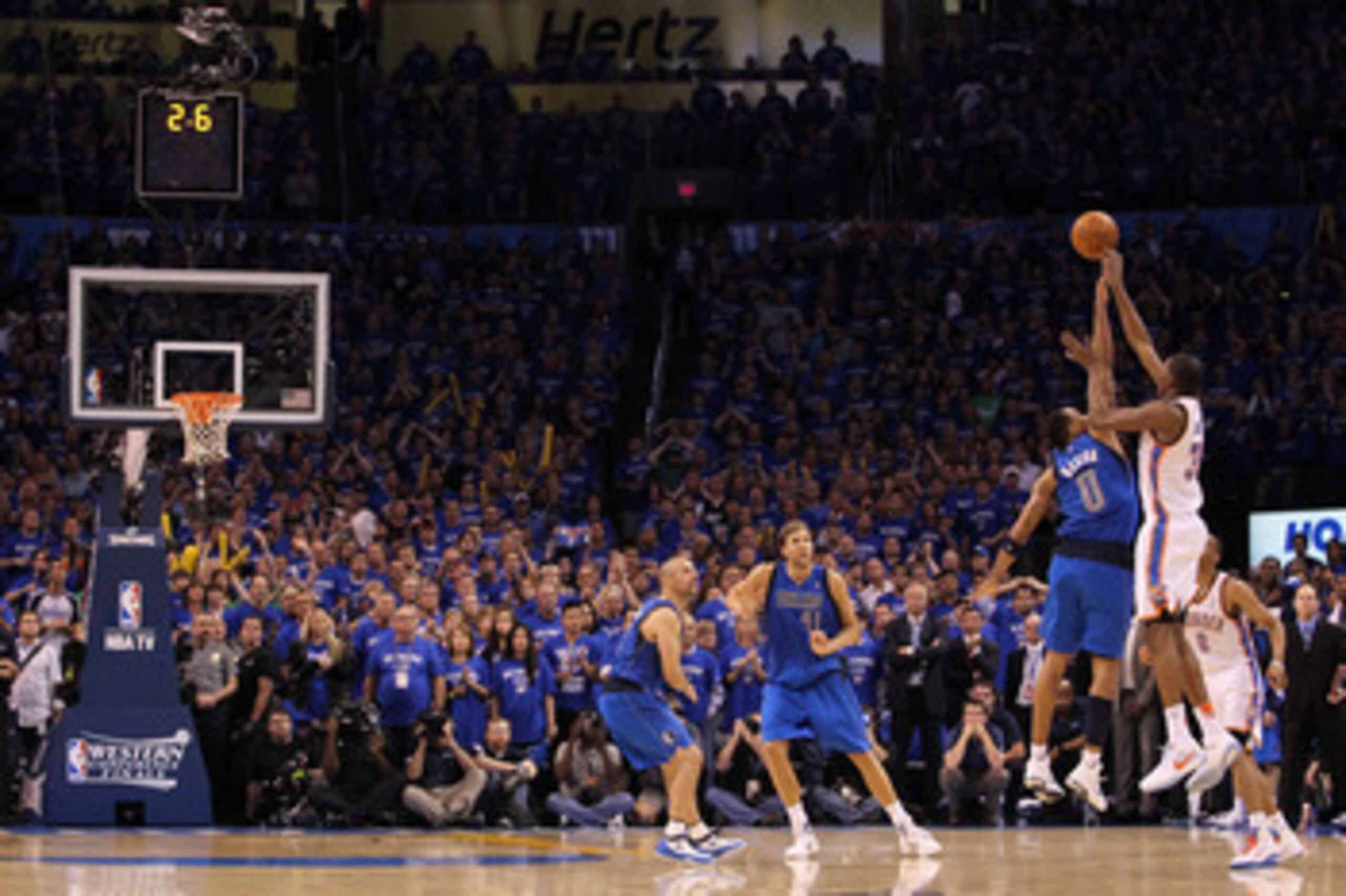 OKLAHOMA CITY, OK - MAY 23:  Kevin Durant #35 of the Oklahoma City Thunder has his three-point attempt blocked by Shawn Marion #0 of the Dallas Mavericks with 2.6 seconds remaining in the fourth quarter in Game Four of the Western Conference Finals during