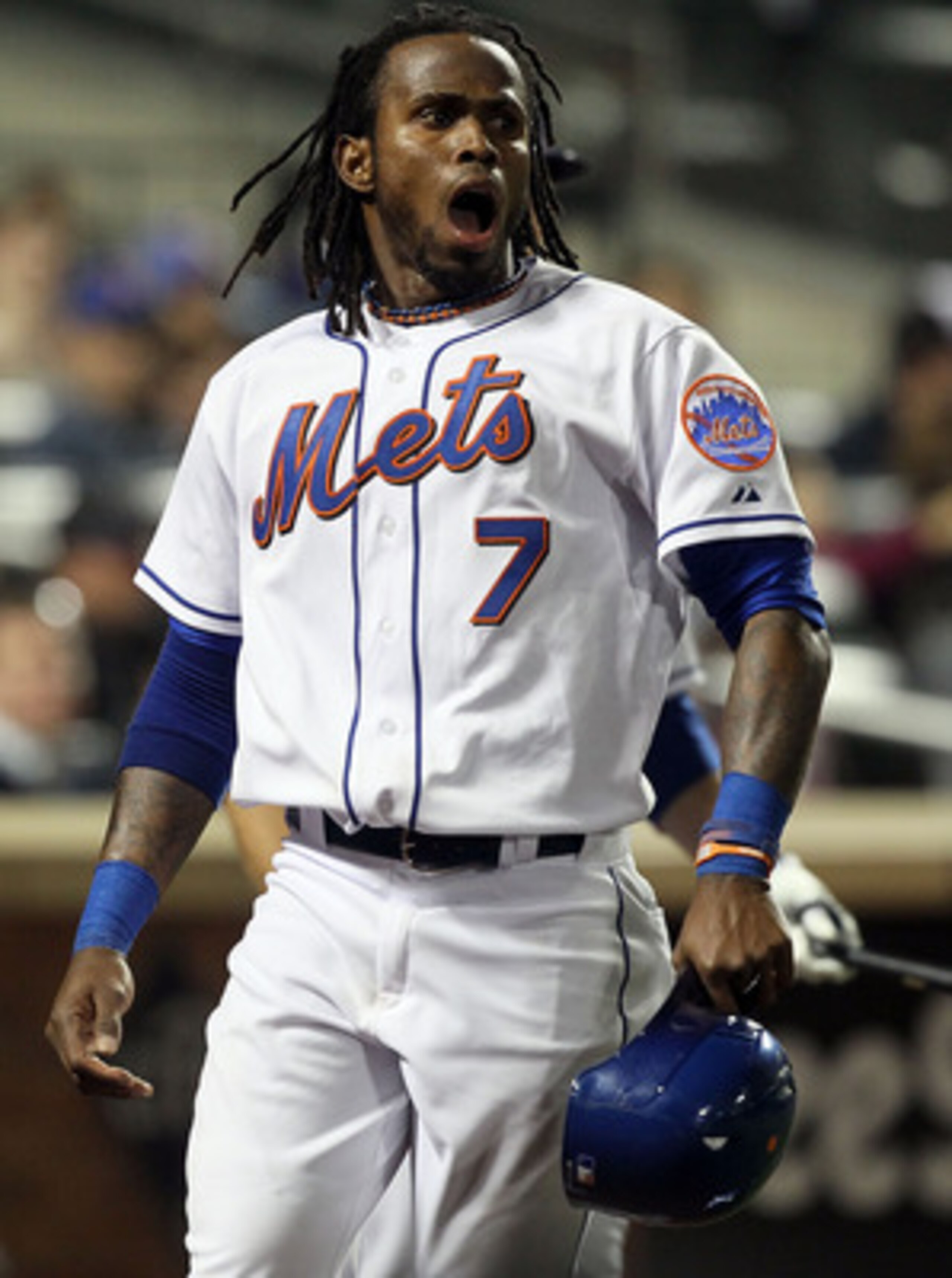 NEW YORK, NY - APRIL 11:  Jose Reyes #7 of the New York Mets celebrates after scoring a run in the third inning against the Colorado Rockies on April 11, 2011 at Citi Field in the Flushing neighborhood of the Queens borough of New York City.  (Photo by Ji