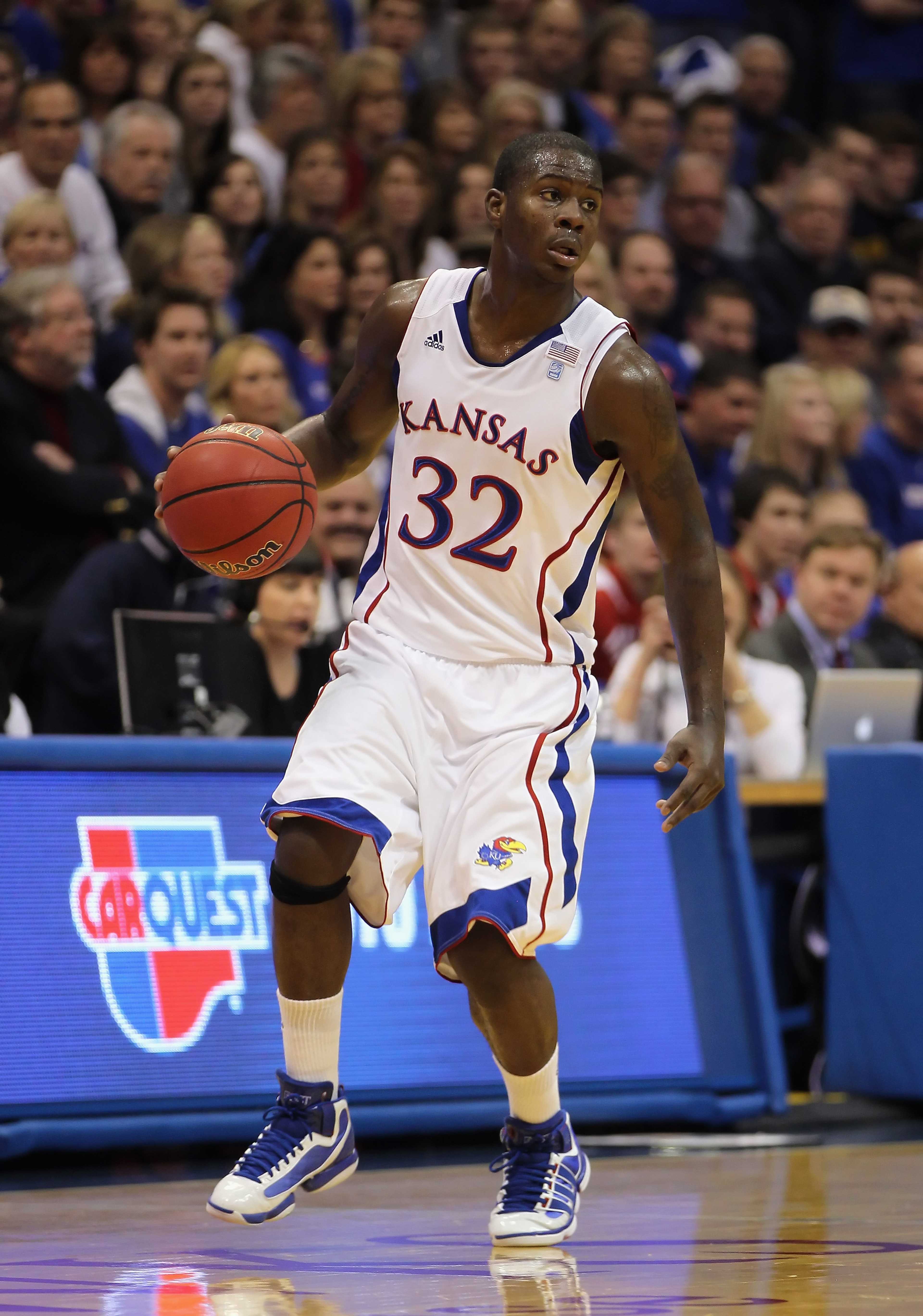 LAWRENCE, KS - DECEMBER 29:  Josh Selby #32 of the Kansas Jayhawks in action during the game against the University of Texas Arlington Mavericks on December 29, 2010 at Allen Fieldhouse in Lawrence, Kansas.  (Photo by Jamie Squire/Getty Images)