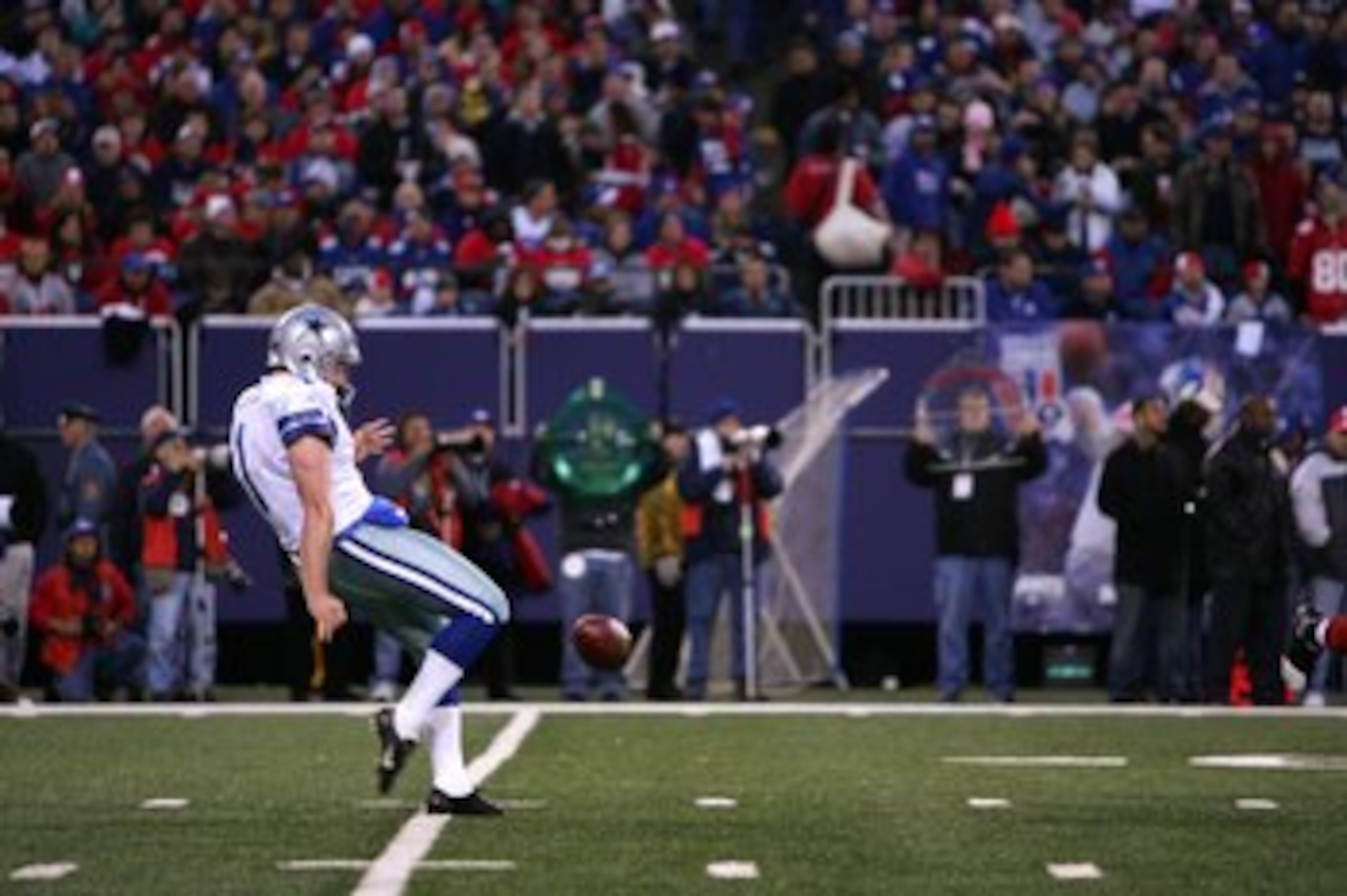 NEW JERSEY - NOVEMBER 11, 2007:  Mat McBriar #1 of the Dallas Cowboys punts the ball during the NFL game against the New York Giants at Giants Stadium on November 11, 2007 in Rutherford, New Jersey. (Photo by Al Bello/Getty Images)