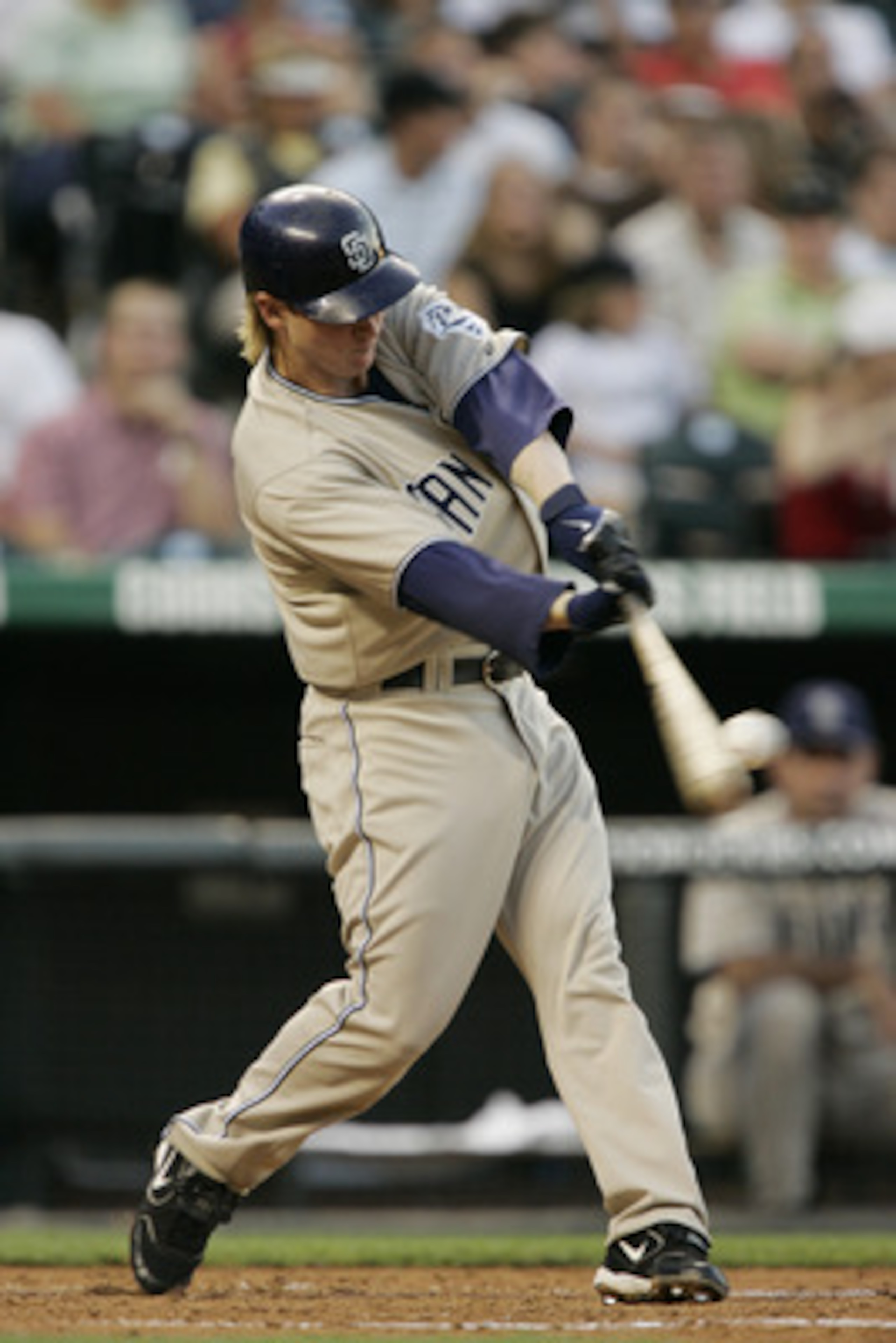 DENVER - JULY 27:  Khalil Greene #3 of the San Diego Padres bats against the Colorado Rockies at Coors Field on July 27, 2006 in Denver, Colorado. The Rockies defeated the Padres 9-8.  (Photo by Brian Bahr/Getty Images)