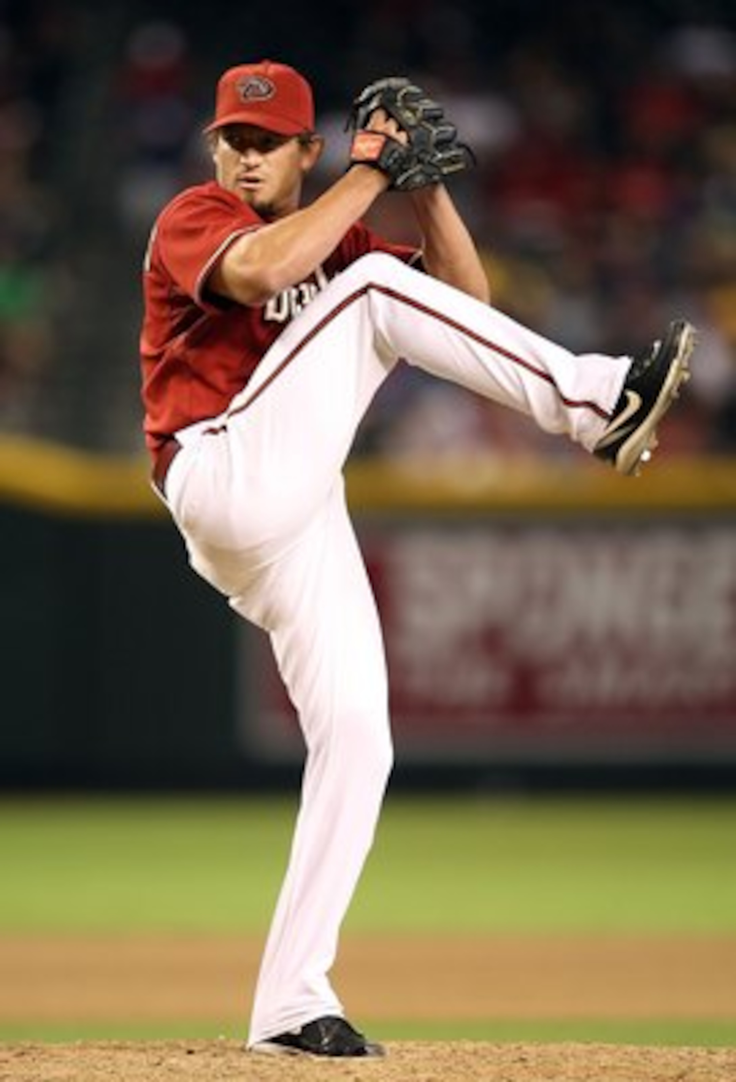 PHOENIX - JULY 28:  Relief pitcher Scott Schoeneweis #60 of the Arizona Diamondbacks pitches against the Philadelphia Phillies during the major league baseball game at Chase Field on July 28, 2009 in Phoenix, Arizona. The Phillies defeated the Diamondback