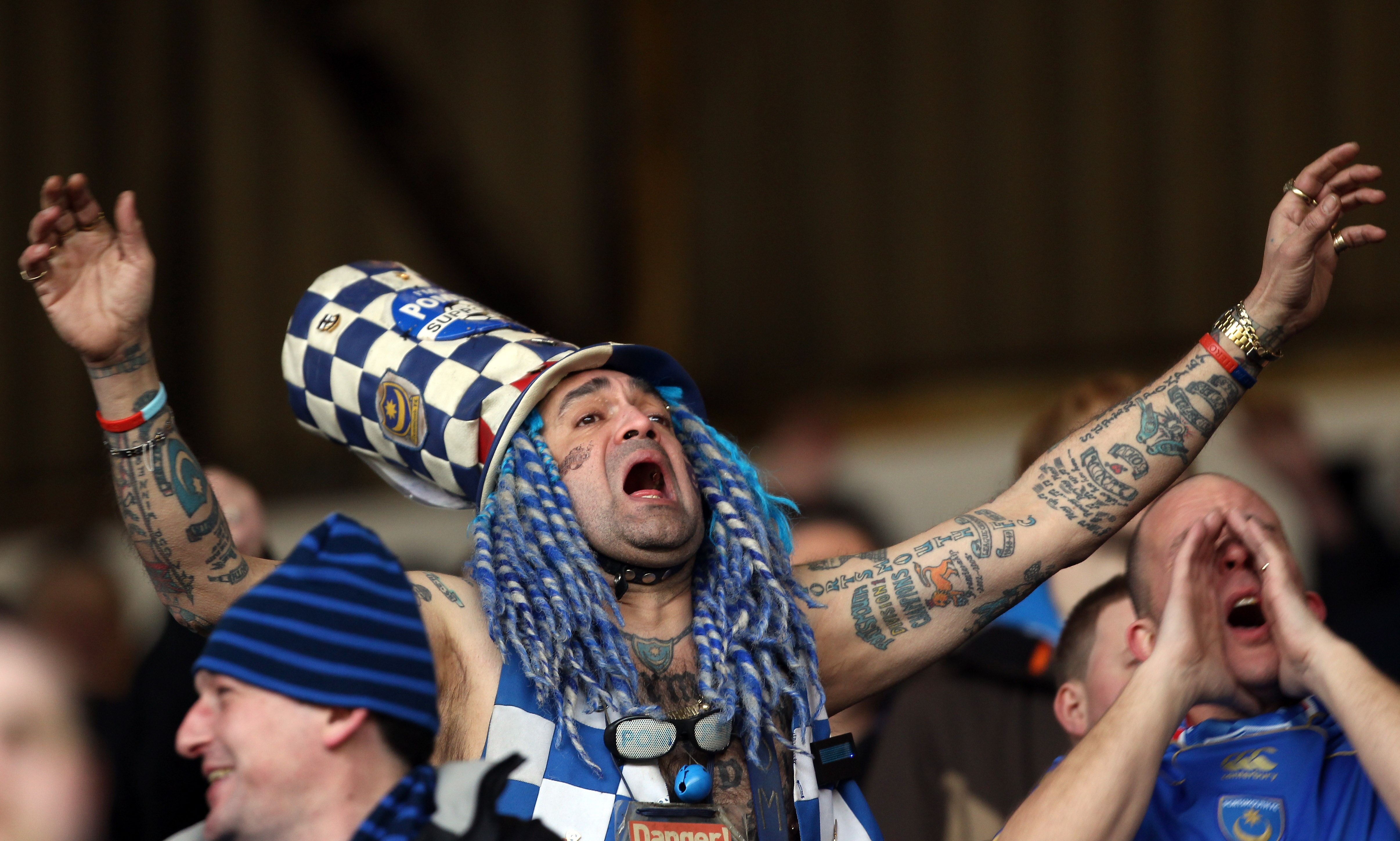 BURNLEY, ENGLAND - FEBRUARY 27:  John Anthony Portsmouth Football Club Westwood sings during the Barclays Premier League match between Burnley and Portsmouth at Turf Moor on February 27, 2010 in Burnley, England.  (Photo by Bryn Lennon/Getty Images)