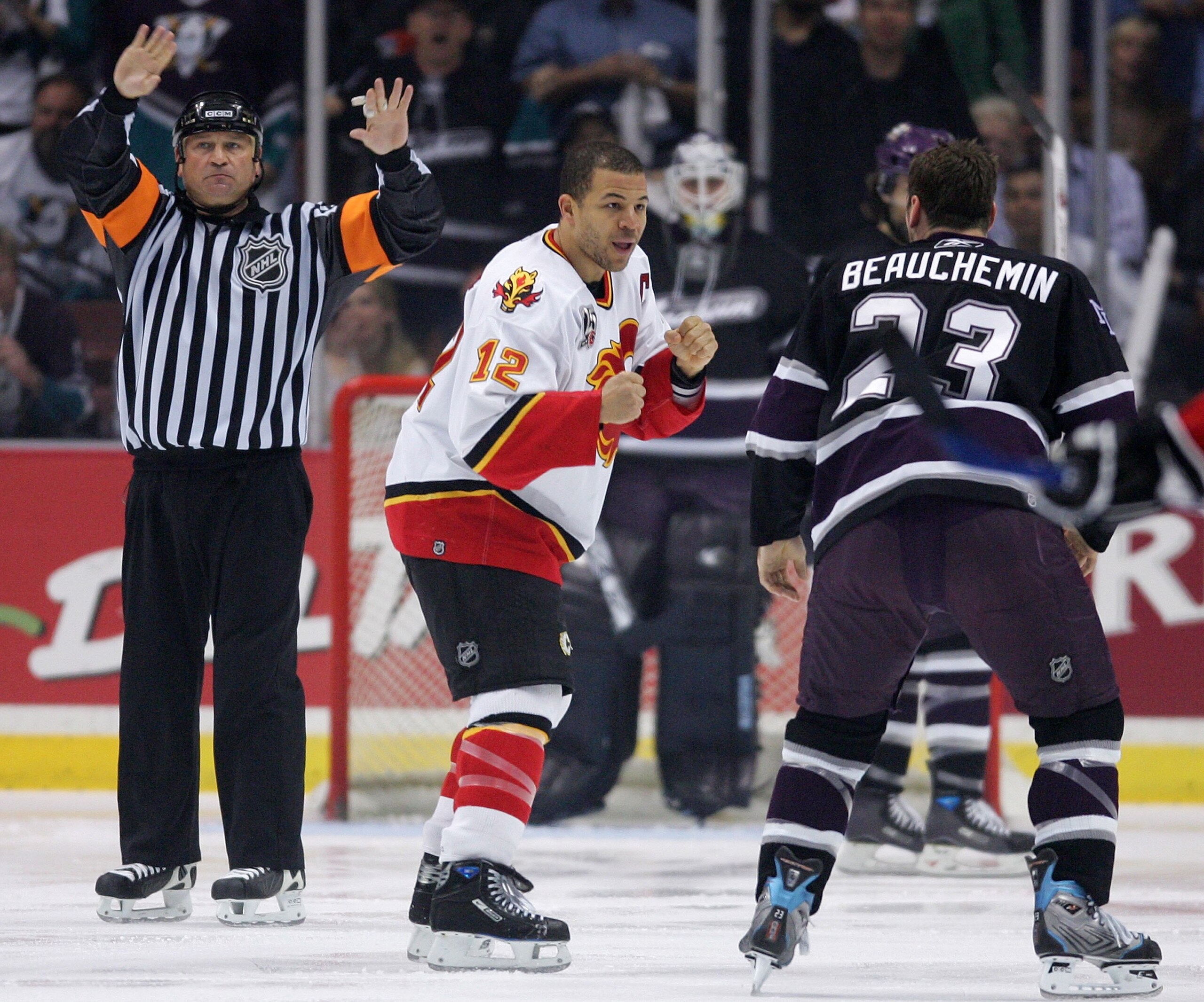 ANAHEIM, CA - MAY 1: Jarome Iginla #12 of the Calgary Flames and Francois Beauchemin #23 of the Mighty Ducks of Anaheim fight during the first period of game six of the Western Conference Quarterfinals on May 1, 2006 at Arrowhead Pond in Anaheim, Califor ANAHEIM, CA - MAY 1: Jarome Iginla #12 of the Calgary Flames and Francois Beauchemin #23 of the Mighty Ducks of Anaheim fight during the first period of game six of the Western Conference Quarterfinals on May 1, 2006 at Arrowhead Pond in Anaheim, Califor
