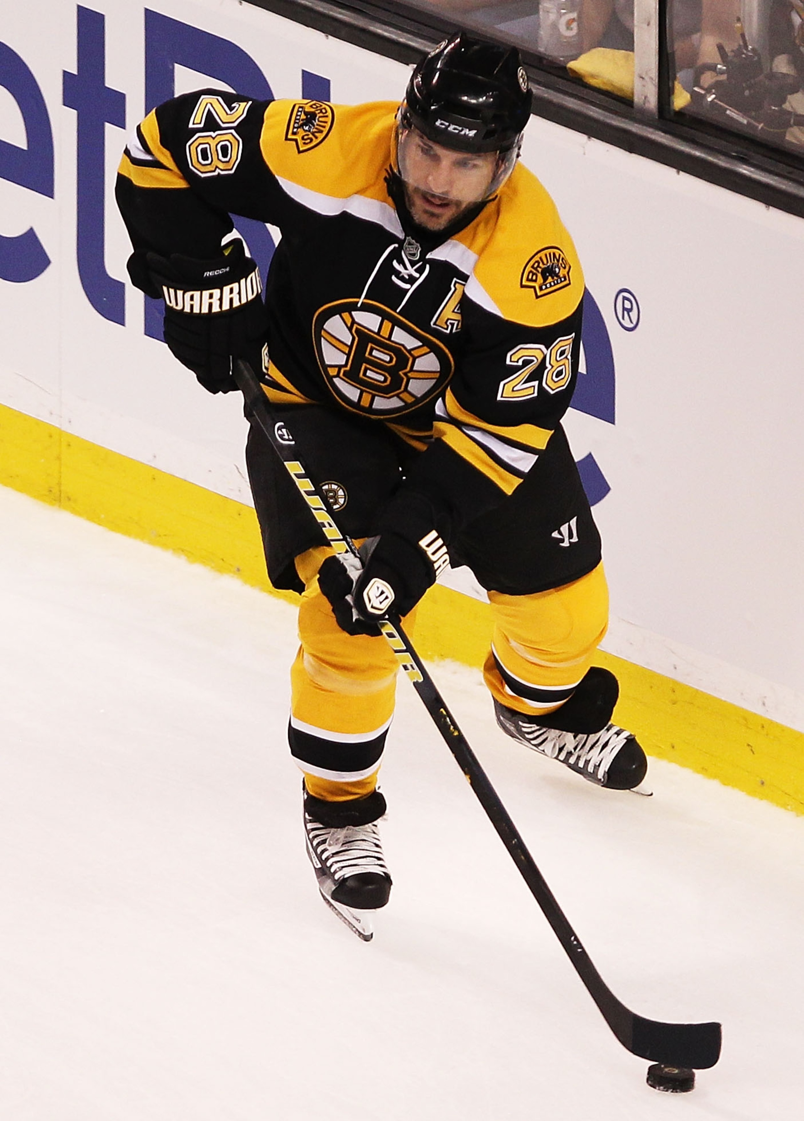BOSTON, MA - MAY 17:  Mark Recchi #28 of the Boston Bruins controls the puck against the Tampa Bay Lightning in Game Two of the Eastern Conference Finals during the 2011 NHL Stanley Cup Playoffs at TD Garden on May 17, 2011 in Boston, Massachusetts.  (Pho