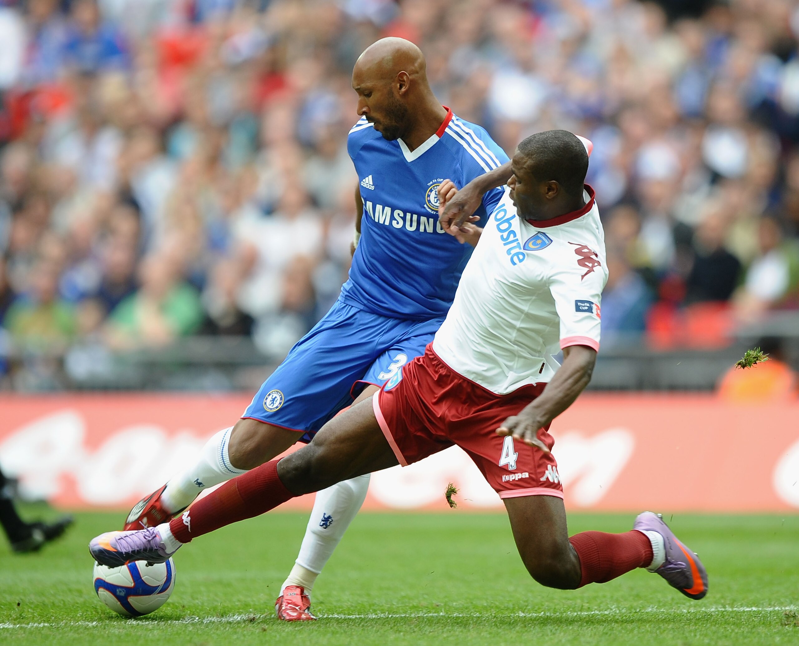 LONDON, ENGLAND - MAY 15:  Nicolas Anelka of Chelsea is tackled by Aaron Mokoena of Portsmouth during the FA Cup sponsored by E.ON Final match between Chelsea and Portsmouth at Wembley Stadium on May 15, 2010 in London, England.  (Photo by Laurence Griffi