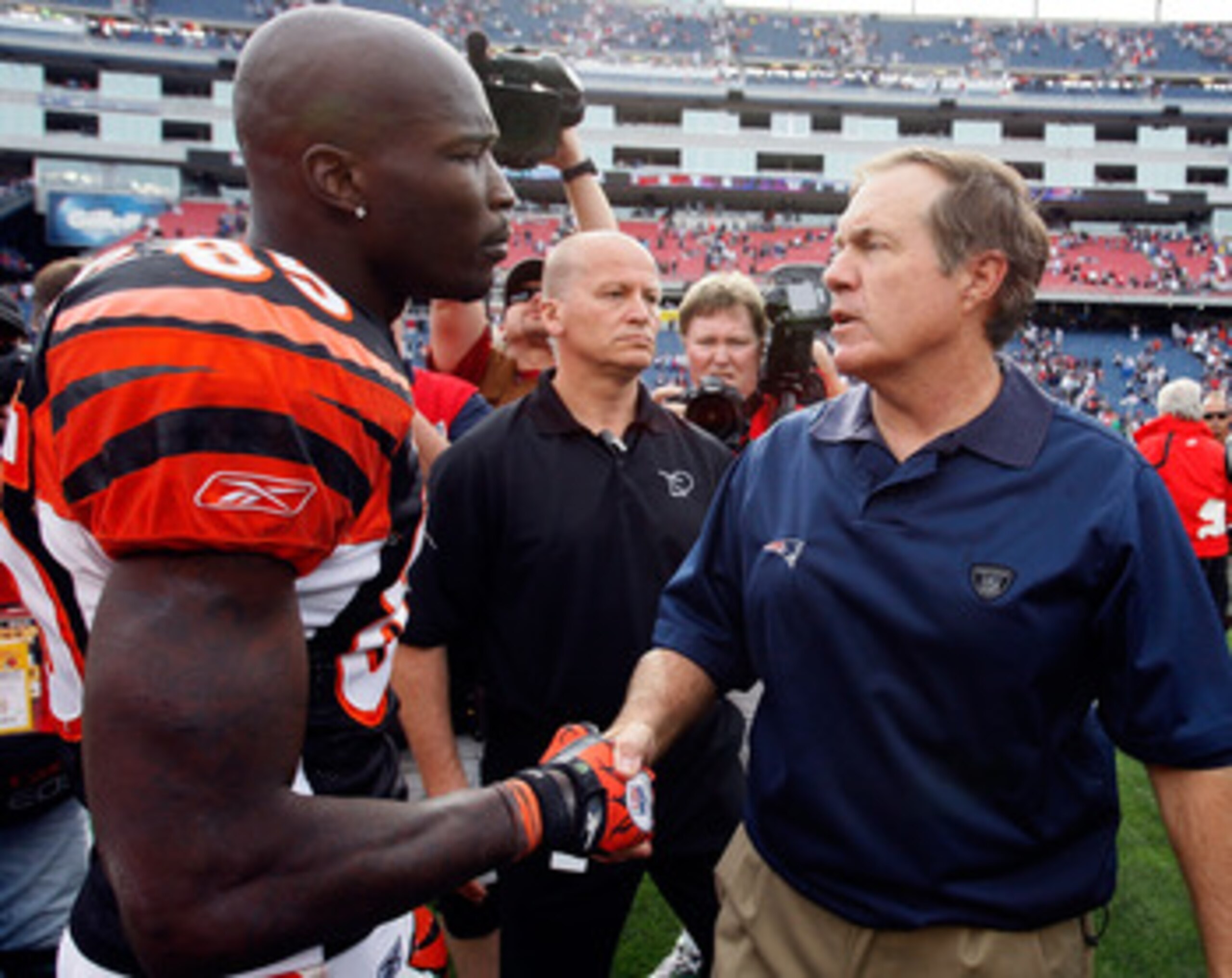 FOXBORO, MA - SEPTEMBER 12: Coach Bill Belichick of the New England Patriots shakes hands with Chad Ochocinco #85 of the Cincinnati Bengals at the completion of the NFL season opener at Gillette Stadium on September 12, 2010 in Foxboro, Massachusetts. T FOXBORO, MA - SEPTEMBER 12: Coach Bill Belichick of the New England Patriots shakes hands with Chad Ochocinco #85 of the Cincinnati Bengals at the completion of the NFL season opener at Gillette Stadium on September 12, 2010 in Foxboro, Massachusetts. T