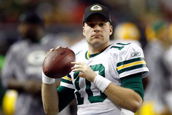 ATLANTA, GA - JANUARY 15:  Matt Flynn #10 of the Green Bay Packers losens up on the sideline against the Atlanta Falcons during their 2011 NFC divisional playoff game at Georgia Dome on January 15, 2011 in Atlanta, Georgia.  (Photo by Chris Graythen/Getty
