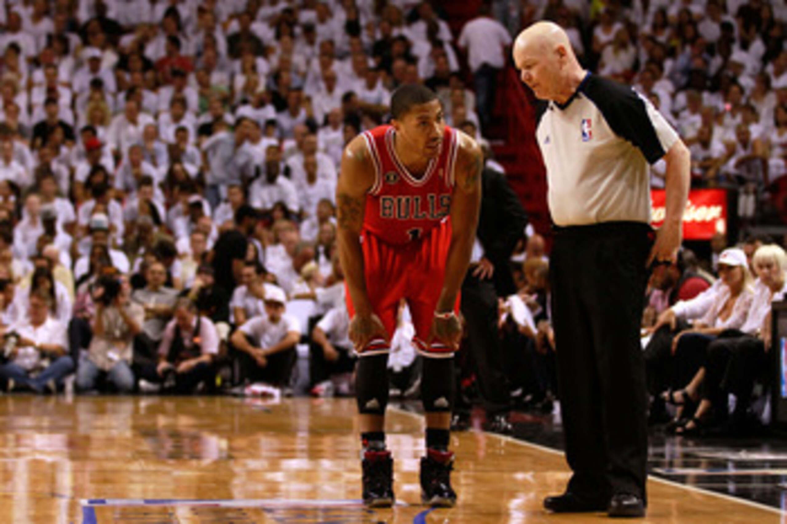 MIAMI, FL - MAY 24:  Derrick Rose #1 of the Chicago Bulls talks with referee Joey Crawford against the Miami Heat in Game Four of the Eastern Conference Finals during the 2011 NBA Playoffs on May 24, 2011 at American Airlines Arena in Miami, Florida. NOTE
