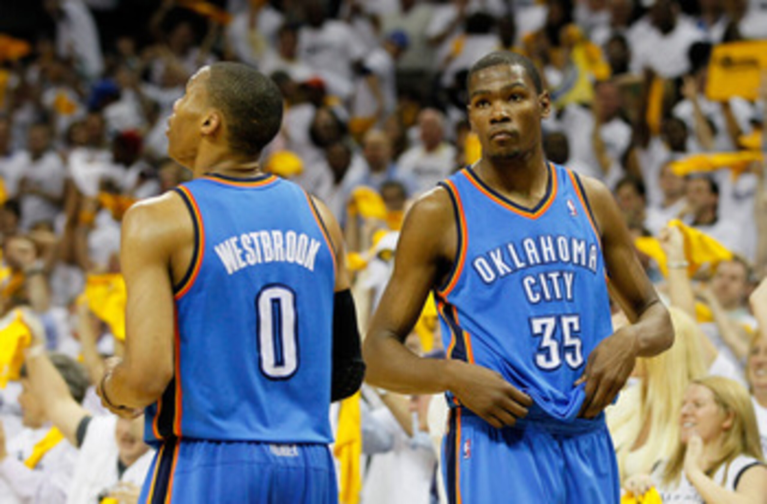 MEMPHIS, TN - MAY 13:  Russell Westbrook #0 and Kevin Durant #35 of the Oklahoma City Thunder react after their 95-83 loss to the Memphis Grizzlies in Game Six of the Western Conference Semifinals in the 2011 NBA Playoffs at FedExForum on May 13, 2011 in