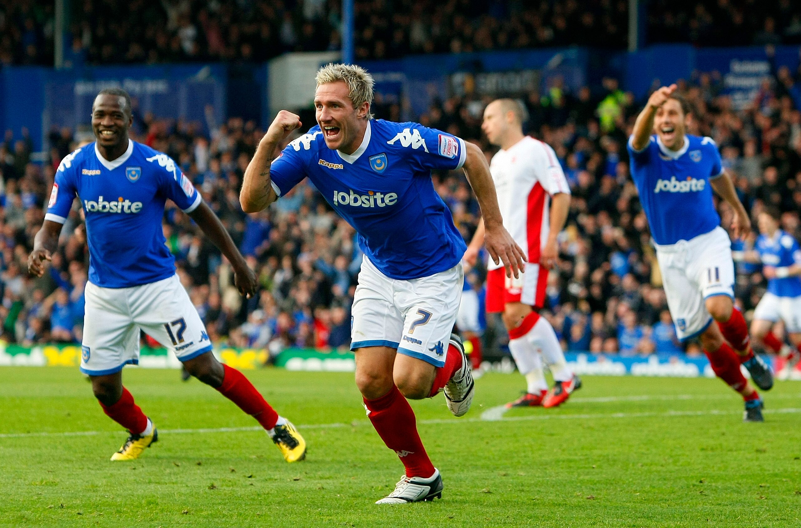 PORTSMOUTH, ENGLAND - OCTOBER 30: Liam Lawrence of Portsmouth celebrates his goal during the npower Championship match between Portsmouth and Nottingham Forest at Fratton Park on October 30, 2010 in Portsmouth, England. (Photo by Tom Dulat/Getty Images)
