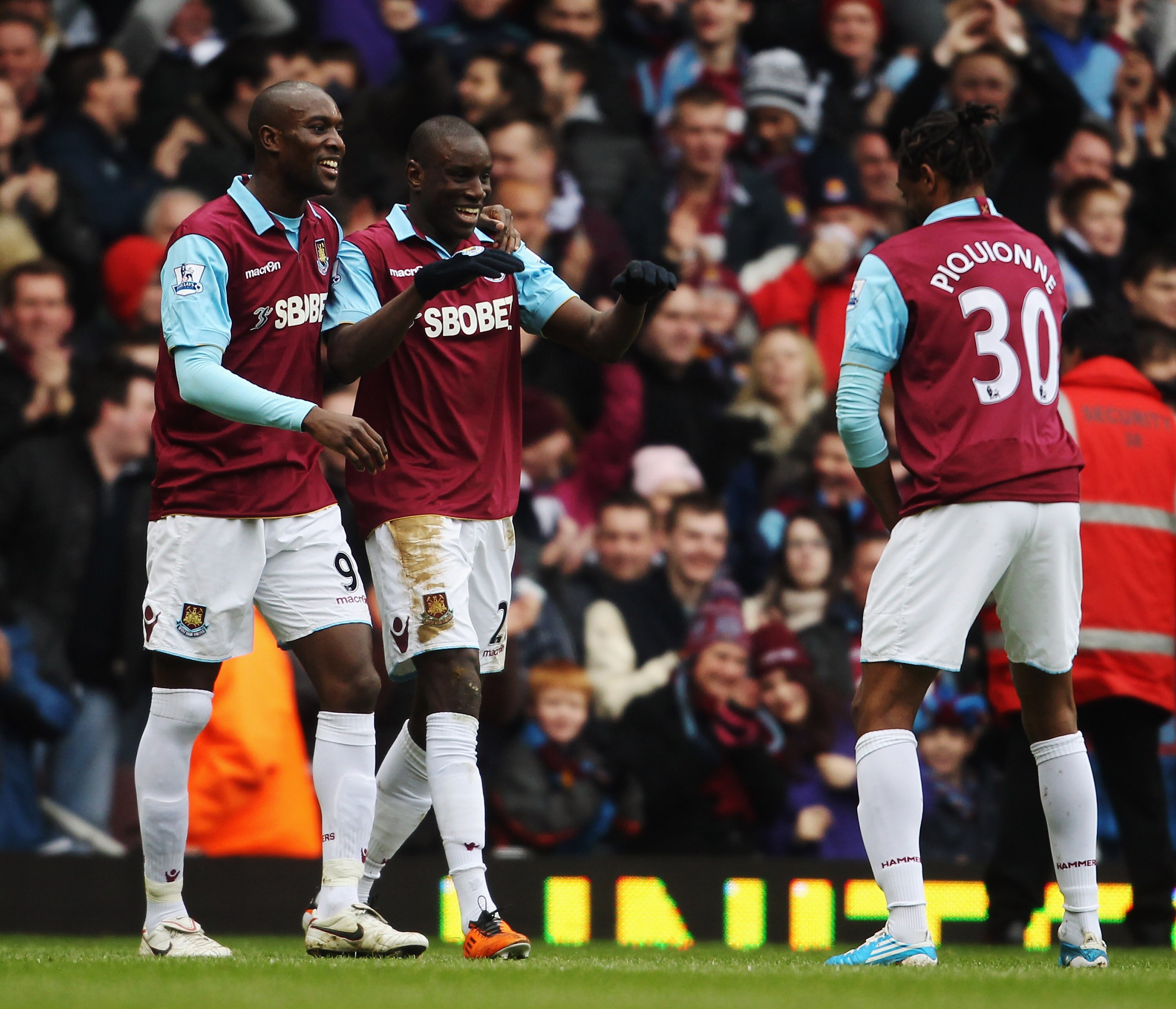 LONDON, UNITED KINGDOM - MARCH 05:  Demba Ba (C) of West Ham United celebrates with team mates after scoring during the Barclays Premier League match between West Ham United and Stoke City at the Boleyn Ground on March 5, 2011 in London, England.  (Photo