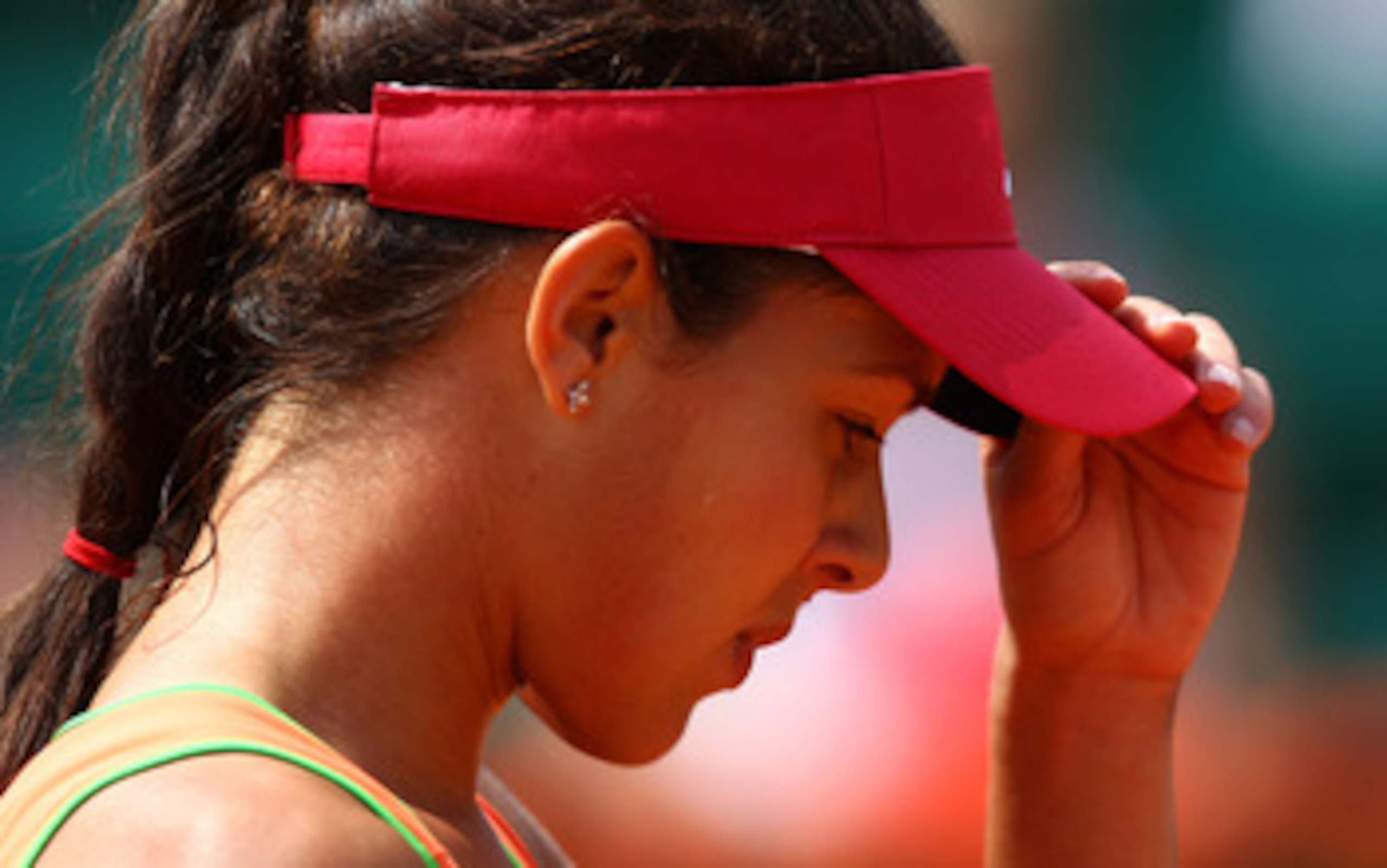 PARIS, FRANCE - MAY 24:  A dejected Ana Ivanovic of Serbia reacts as she heads towards defeat during the women's singles round one match between Johanna Larsson of Sweden and Ana Ivanovic of Serbia on day three of the French Open at Roland Garros on May 2