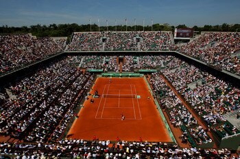 PARIS, FRANCE - MAY 23:  A general view of Court Phillippe Chatrier as Roger Federer of Switzerland serves during the men's singles first round match between Feliciano Lopez of Spain and Roger Federer of Switzerland on day two of the French Open at Roland