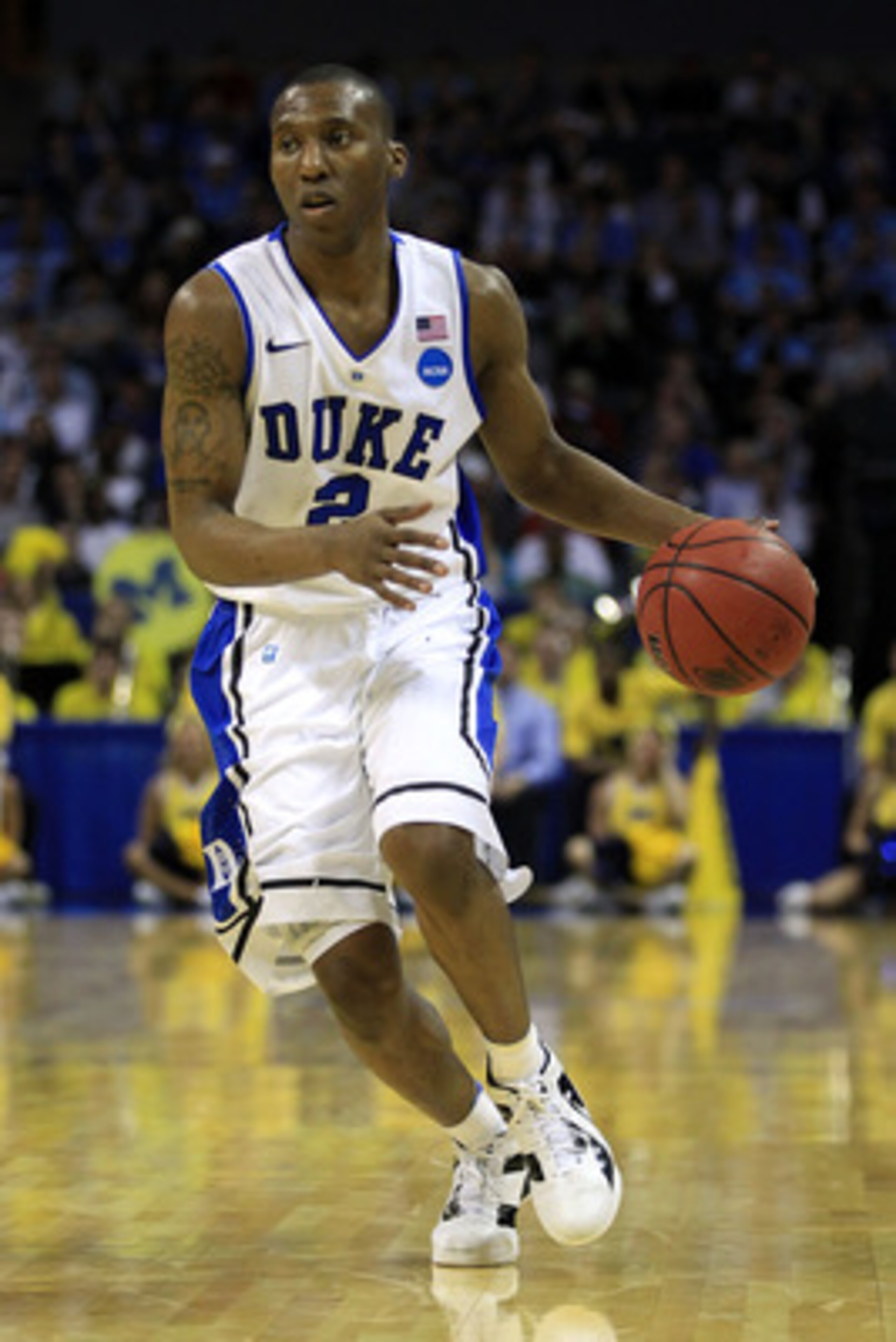 CHARLOTTE, NC - MARCH 20:  Nolan Smith #2 of the Duke Blue Devils moves the ball while taking on the Michigan Wolverines during the third round of the 2011 NCAA men's basketball tournament at Time Warner Cable Arena on March 20, 2011 in Charlotte, North C