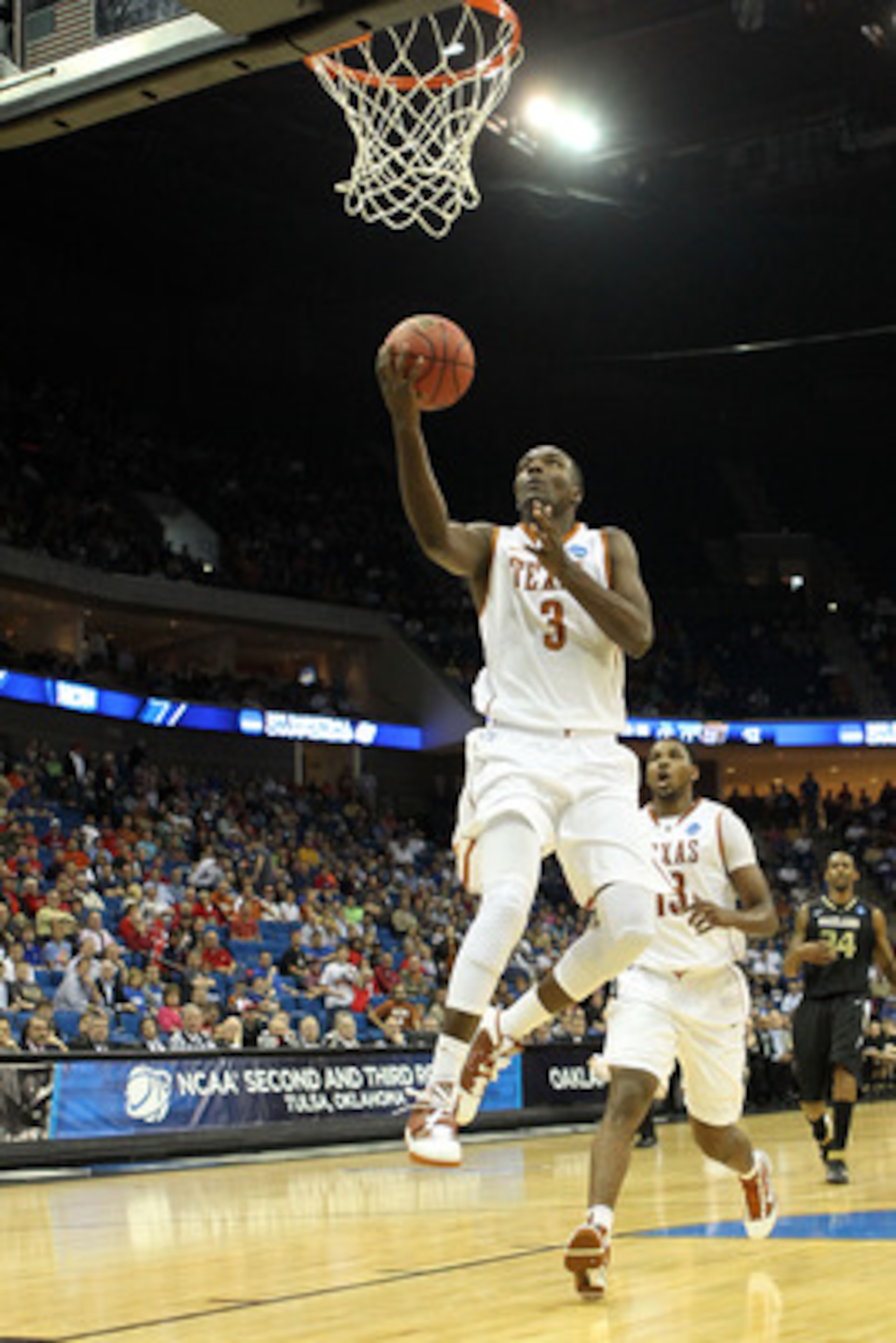 TULSA, OK - MARCH 18:  Jordan Hamilton #3 of the Texas Longhorns goes up for a shot against the Oakland Golden Grizzlies during the second round of the 2011 NCAA men's basketball tournament at BOK Center on March 18, 2011 in Tulsa, Oklahoma.  (Photo by Ro