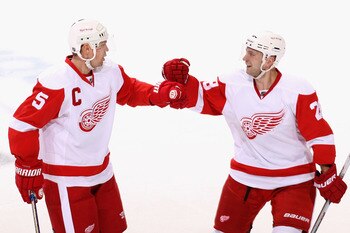 GLENDALE, AZ - APRIL 14:  Nicklas Lidstrom #5 and Brian Rafalski #28 of the Detroit Red Wings celebrate after Nicklas Lidstrom scored a first period power play goal against the Phoenix Coyotes in Game One of the Western Conference Quarterfinals during the