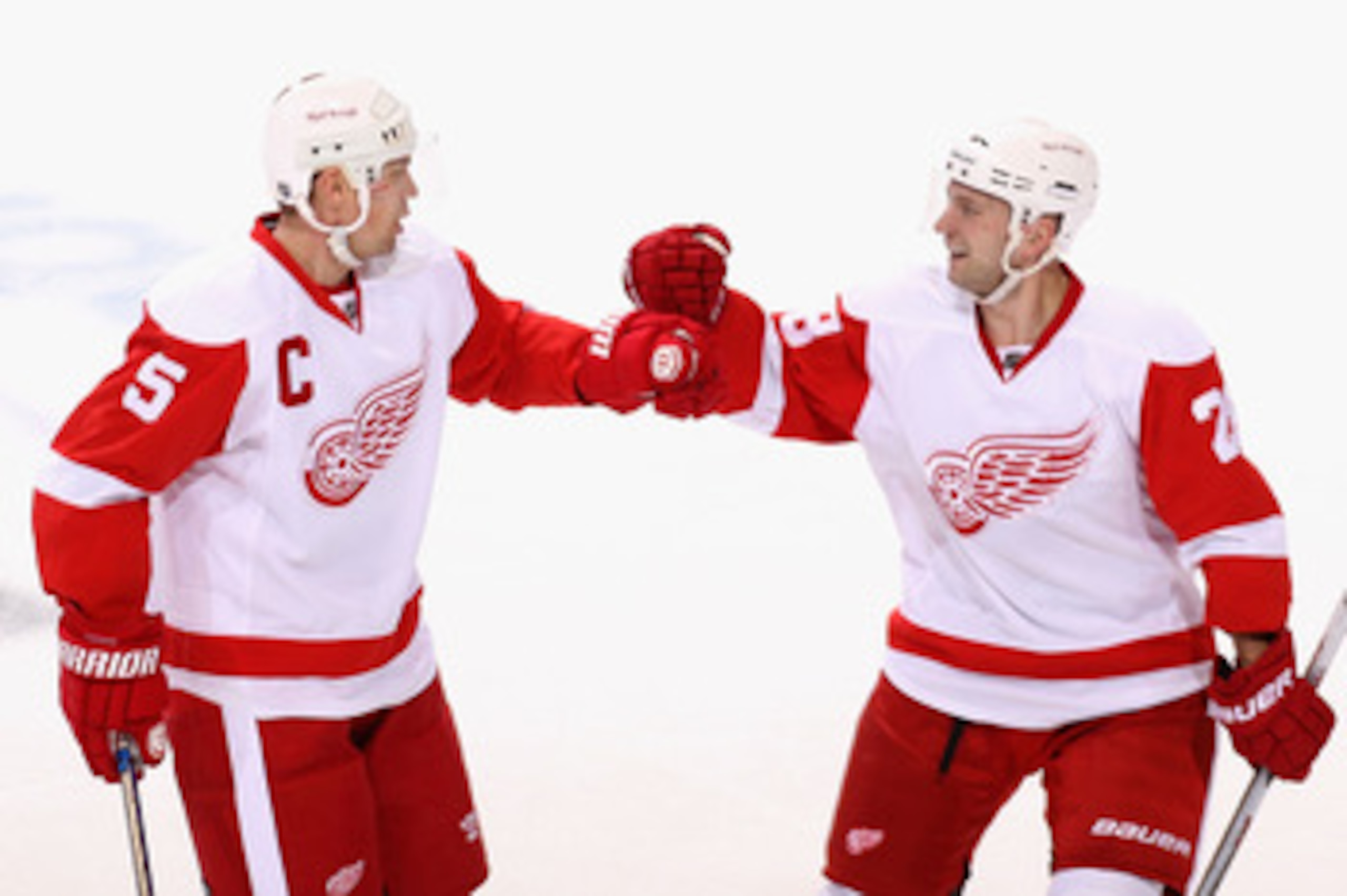 GLENDALE, AZ - APRIL 14:  Nicklas Lidstrom #5 and Brian Rafalski #28 of the Detroit Red Wings celebrate after Nicklas Lidstrom scored a first period power play goal against the Phoenix Coyotes in Game One of the Western Conference Quarterfinals during the
