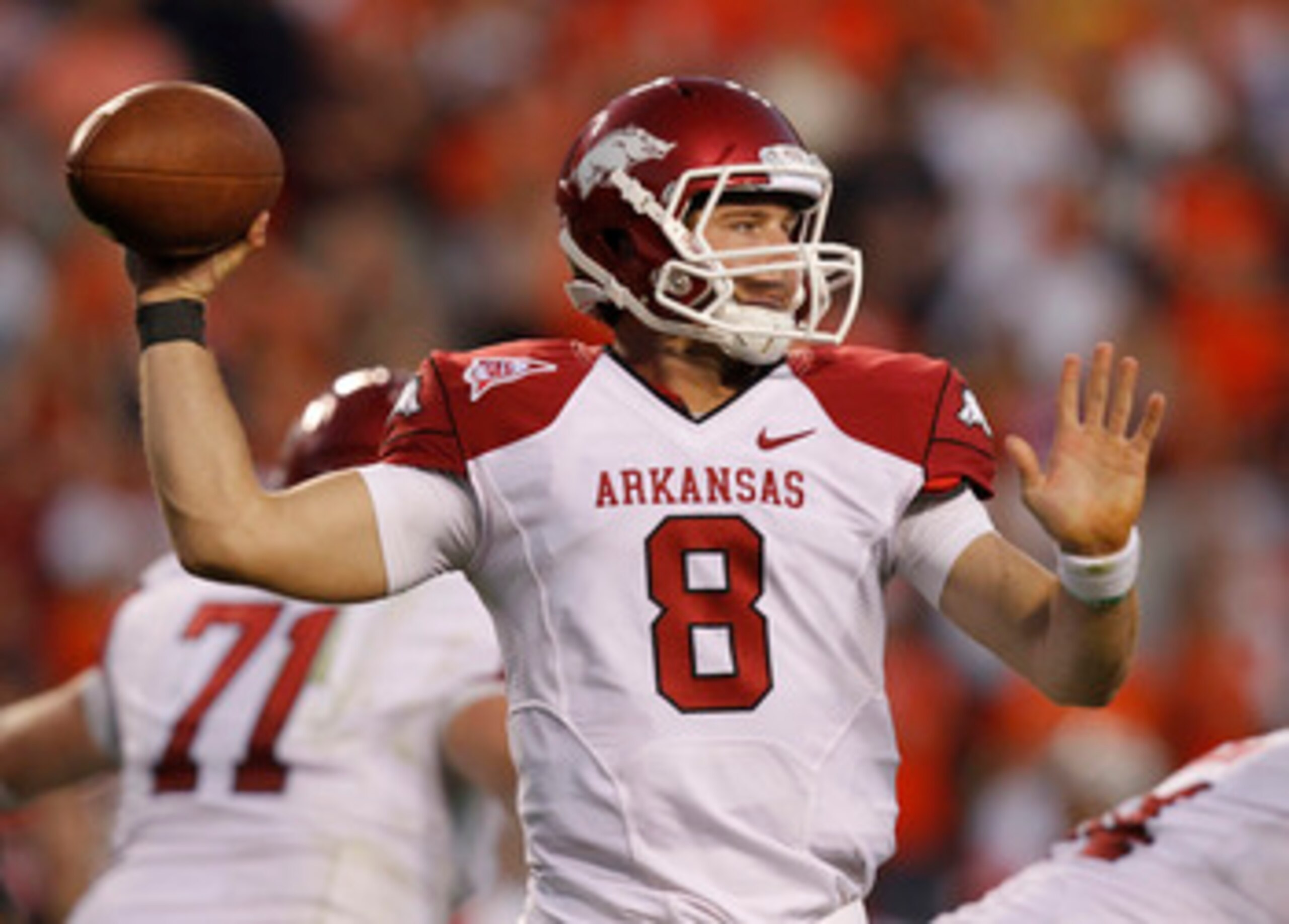 AUBURN - OCTOBER 16: Backup quarterback Tyler Wilson #8 of the Arkansas Razorbacks threw for 332 yards and 4 touchdowns during the game against the Auburn Tigers at Jordan-Hare Stadium on October 16, 2010 in Auburn, Alabama. The Tigers beat the Razorbac AUBURN - OCTOBER 16: Backup quarterback Tyler Wilson #8 of the Arkansas Razorbacks threw for 332 yards and 4 touchdowns during the game against the Auburn Tigers at Jordan-Hare Stadium on October 16, 2010 in Auburn, Alabama. The Tigers beat the Razorbac