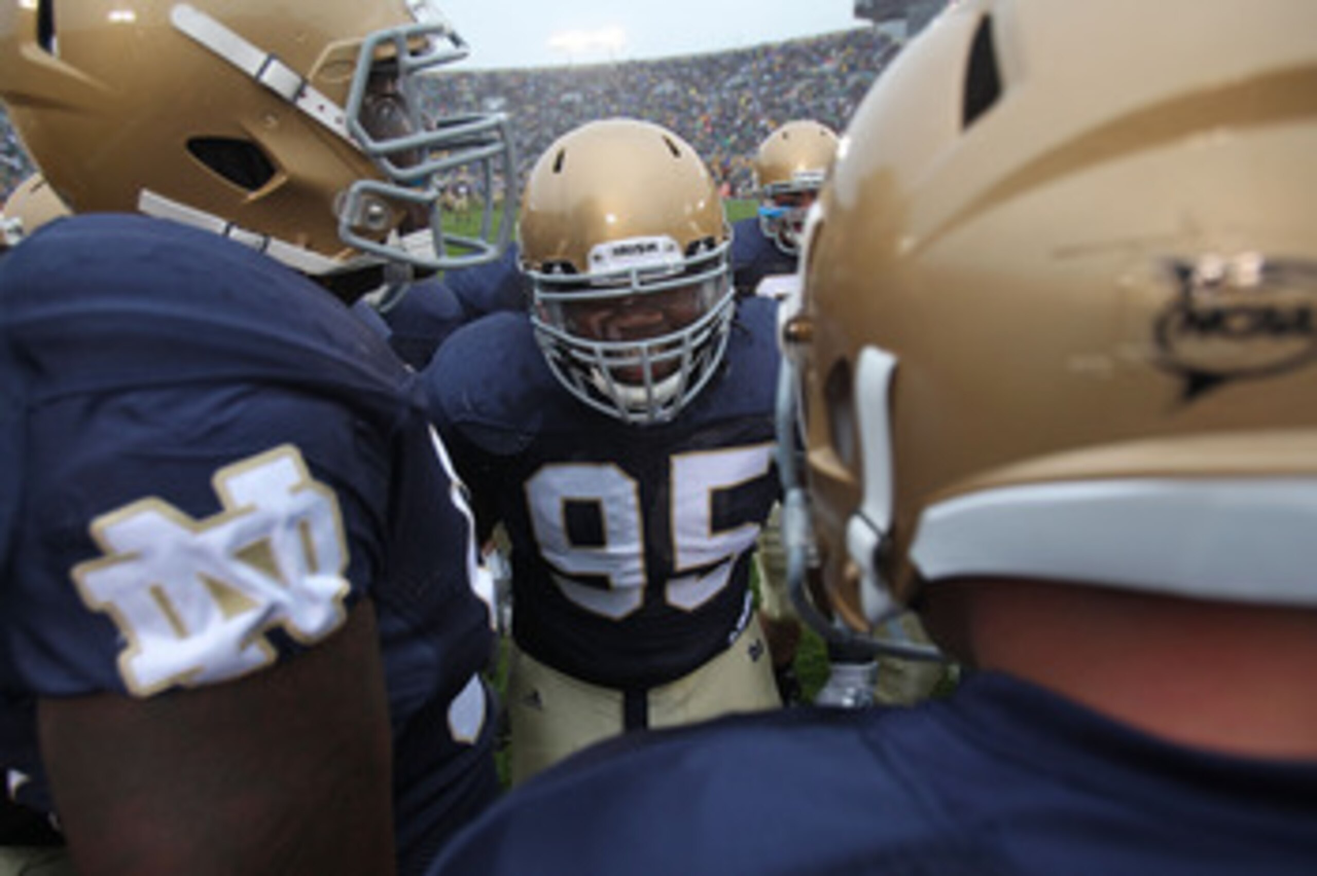 SOUTH BEND, IN - SEPTEMBER 11: Ian Williams #95 of the Notre Dame Fighting Irish fires up his defensive teammates during warm-ups before a game against the Michigan Wolverines at Notre Dame Stadium on September 11, 2010 in South Bend, Indiana. Michigan de