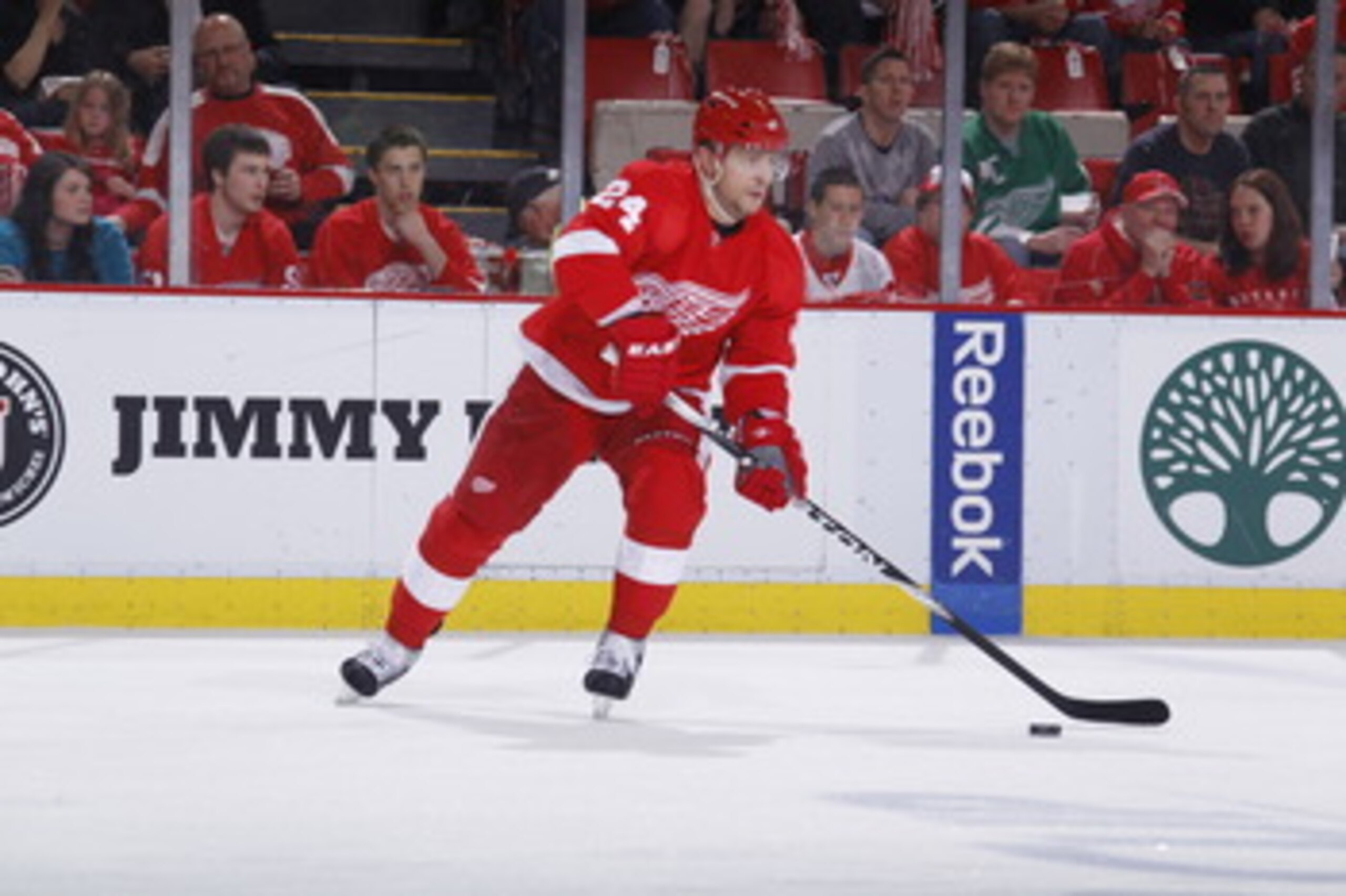 DETROIT - MAY 6: Ruslan Salei #24 of the Detroit Red Wings skates with the puck while playing the San Jose Sharks in Game Four of the Western Conference Semifinals during the 2011 NHL Stanley Cup Playoffs on May 6, 2011 at Joe Louis Arena in Detroit, Mich