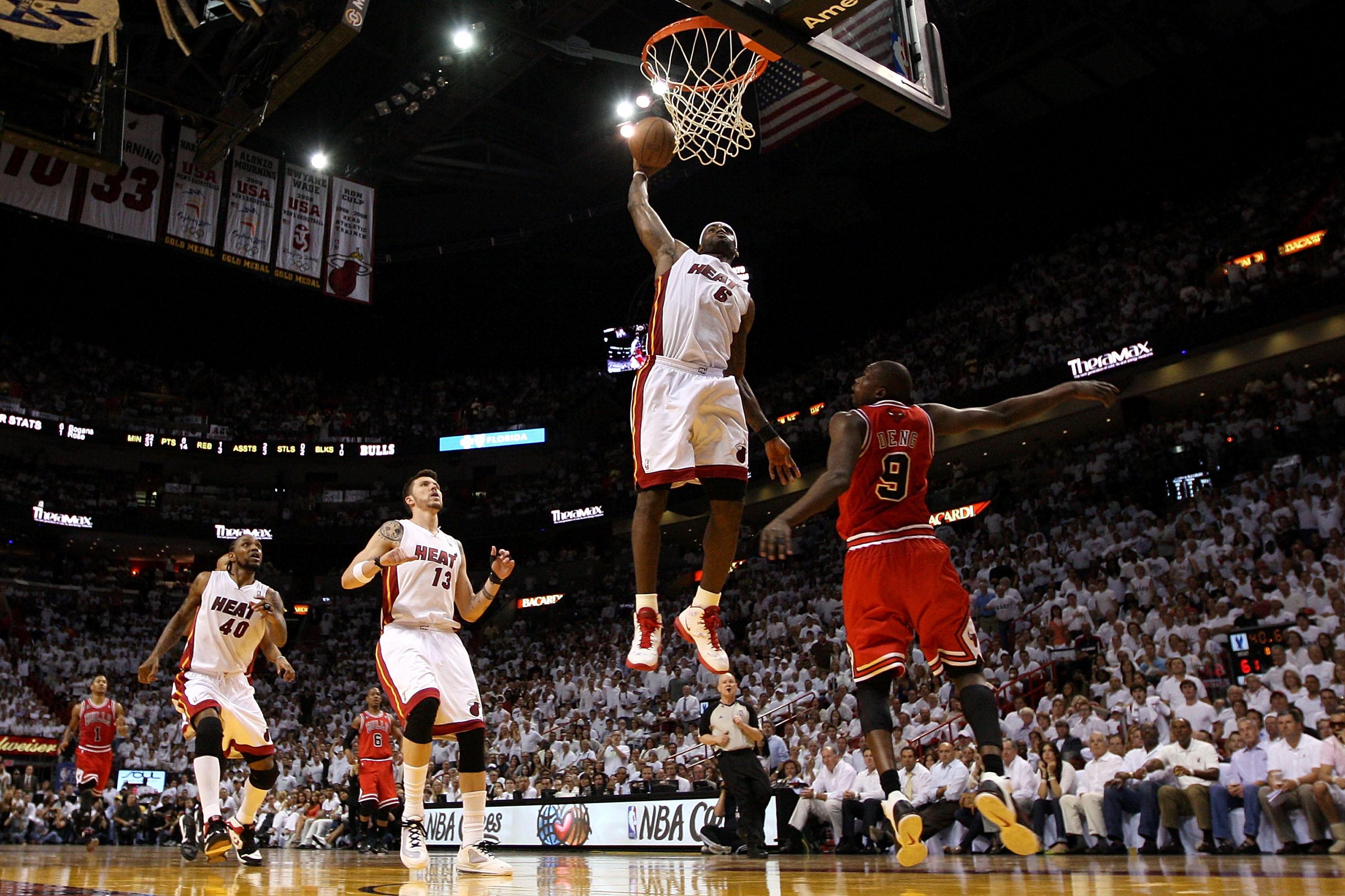 MIAMI, FL - MAY 24:  LeBron James #6 of the Miami Heat dunks on Luol Deng #9 of the Chicago Bulls  in Game Four of the Eastern Conference Finals during the 2011 NBA Playoffs on May 24, 2011 at American Airlines Arena in Miami, Florida. NOTE TO USER: User