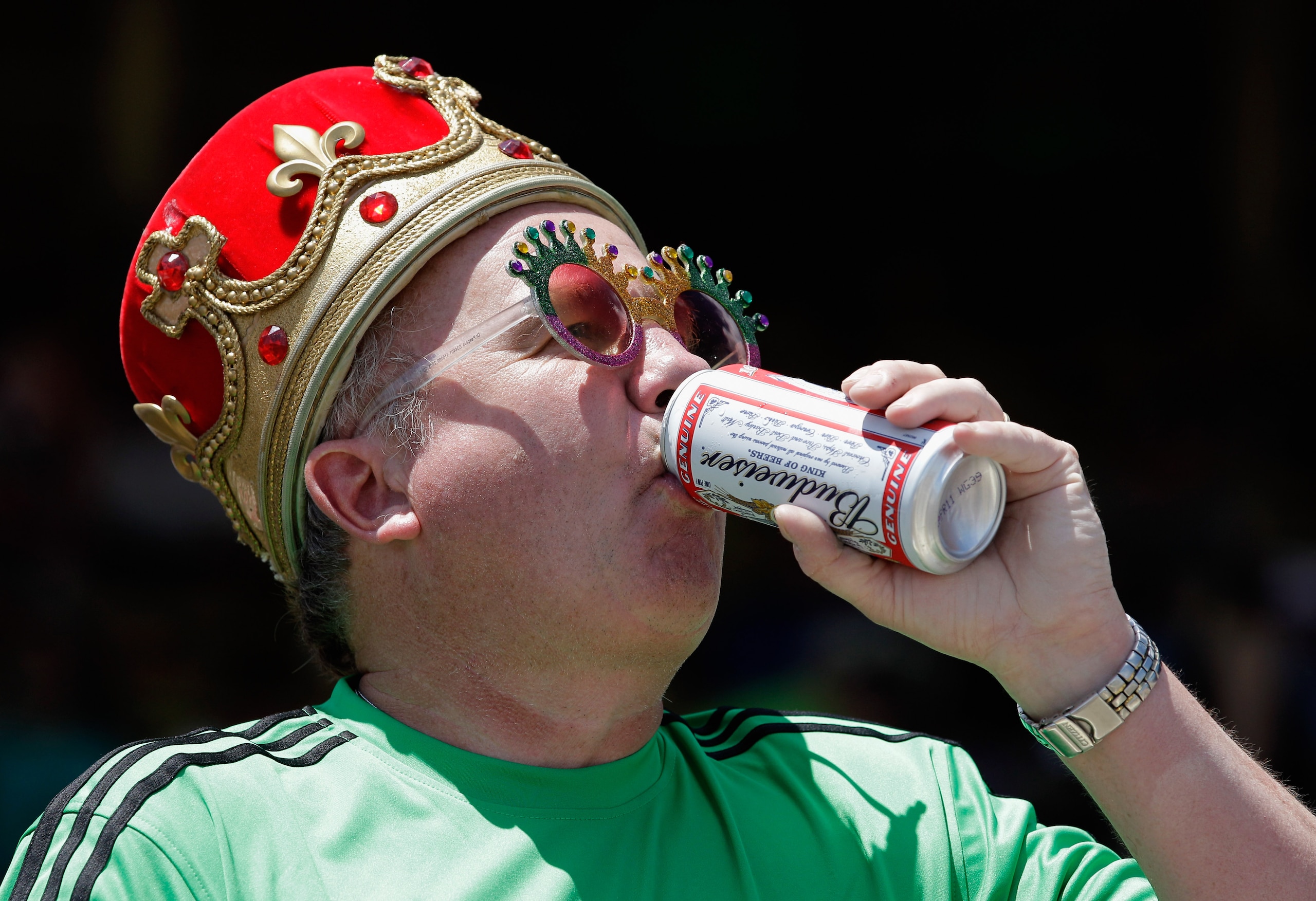 BALTIMORE, MD - MAY 21: Joe O'Dea drinks a beer before the 136th running of the Preakness Stakes  at Pimlico Race Course on May 21, 2011 in Baltimore, Maryland.  (Photo by Rob Carr/Getty Images)