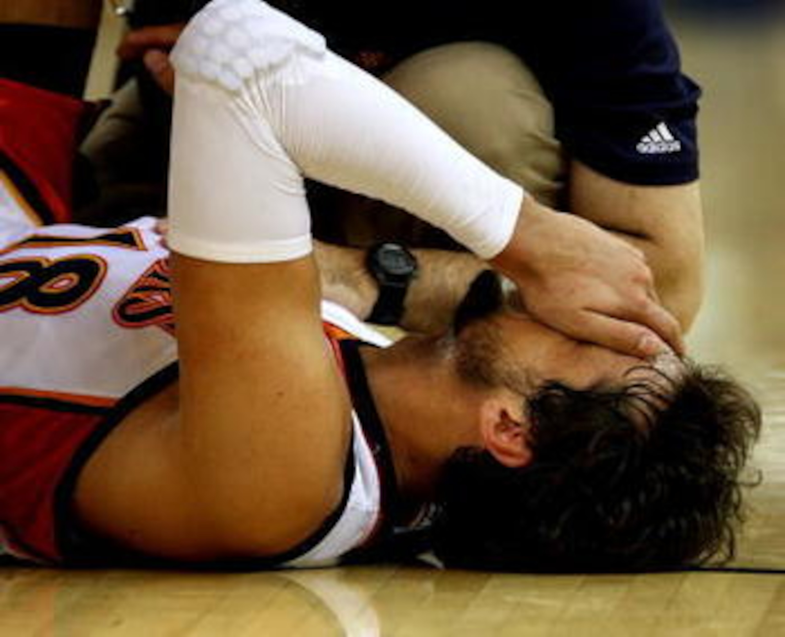 OAKLAND, CA - JANUARY 11:  Marco Belinelli #18 of the Golden State Warriors is in pain after an injury against the Indiana Pacers during an NBA game on January 11, 2009 at Oracle Arena in Oakland, California. NOTE TO USER: User expressly acknowledges and
