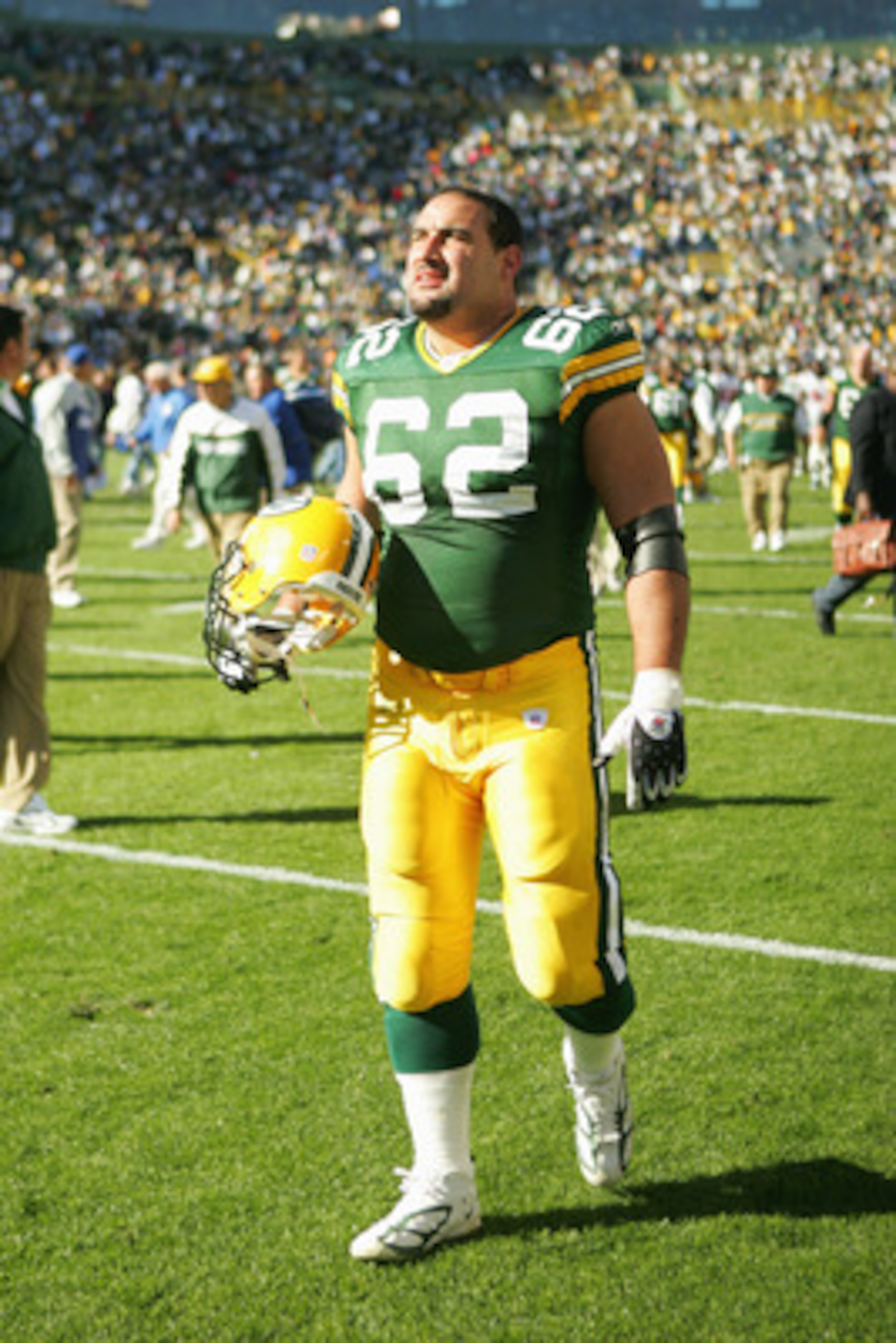 GREEN BAY, WI - OCTOBER 3: Guard Marco Rivera #52 of the Green Bay Packers leaves the field after the game against the New York Giants on October 3, 2004 at Lambeau Field in Green Bay, Wisconsin. The Giants won 14-7. (Photo by Matthew Stockman/Getty Im GREEN BAY, WI - OCTOBER 3: Guard Marco Rivera #52 of the Green Bay Packers leaves the field after the game against the New York Giants on October 3, 2004 at Lambeau Field in Green Bay, Wisconsin. The Giants won 14-7. (Photo by Matthew Stockman/Getty Im