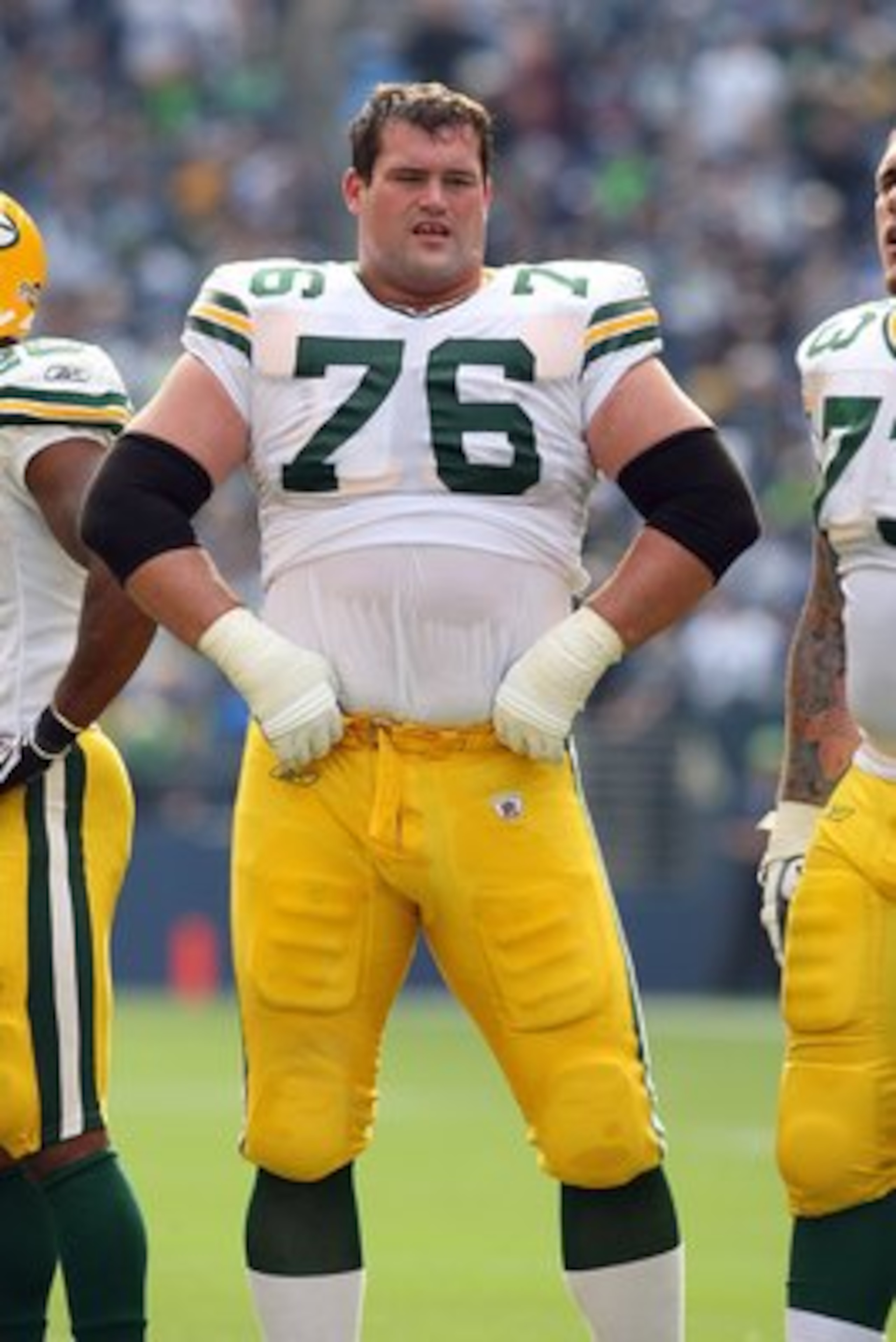SEATTLE - OCTOBER 12:  Chad Clifton #76 of the Green Bay Packers looks on during a break in the game against the Seattle Seahawks on October 12, 2008 at Qwest Field in Seattle, Washington. The Packers defeated the Seahawks 27-17. (Photo by Otto Greule Jr.