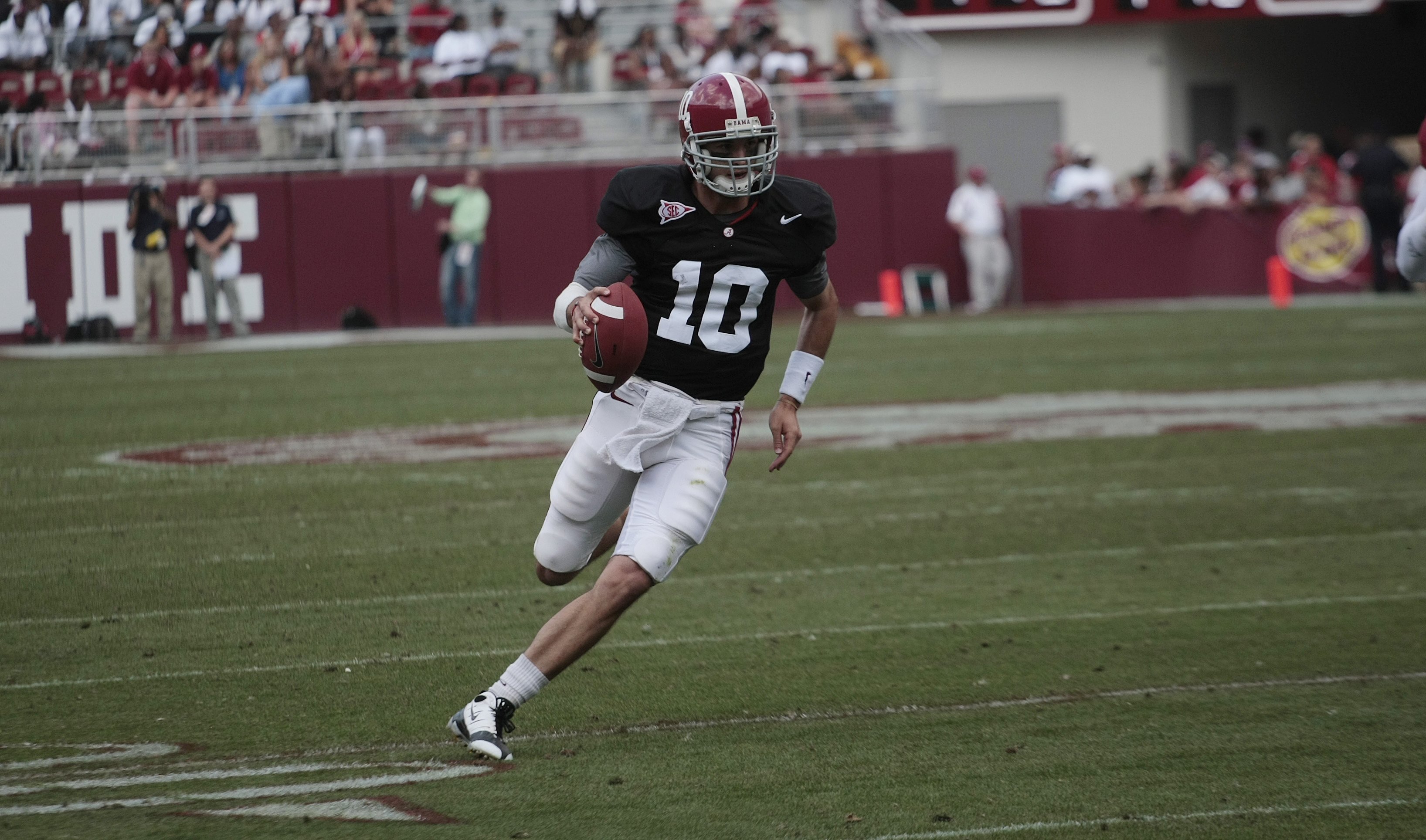 TUSCALOOSA, AL - APRIL 17: Quarterback A. J. McCarron #10 of the Alabama Crimson Tide runs for a first down during the Alabama spring game at Bryant Denny Stadium on April 17, 2010 in Tuscaloosa, Alabama. (Photo by Dave Martin/Getty Images)