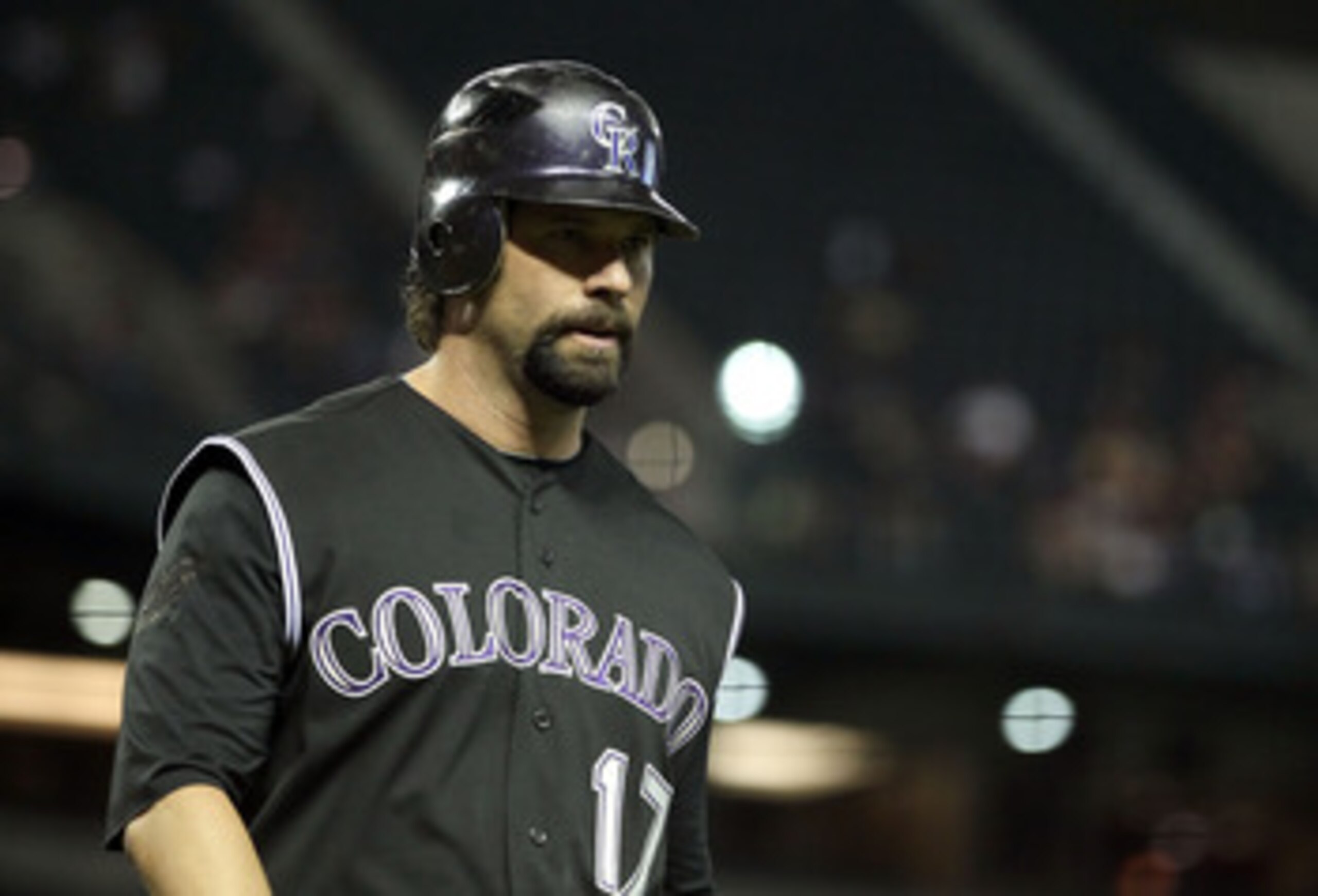 PHOENIX, AZ - MAY 03: Todd Helton #17 of the Colorado Rockies walks to the dugout during the Major League Baseball against the Arizona Diamondbacks game at Chase Field on May 3, 2011 in Phoenix, Arizona. The Diamondbacks defeated the Rockies 4-3. (Phot PHOENIX, AZ - MAY 03: Todd Helton #17 of the Colorado Rockies walks to the dugout during the Major League Baseball against the Arizona Diamondbacks game at Chase Field on May 3, 2011 in Phoenix, Arizona. The Diamondbacks defeated the Rockies 4-3. (Phot
