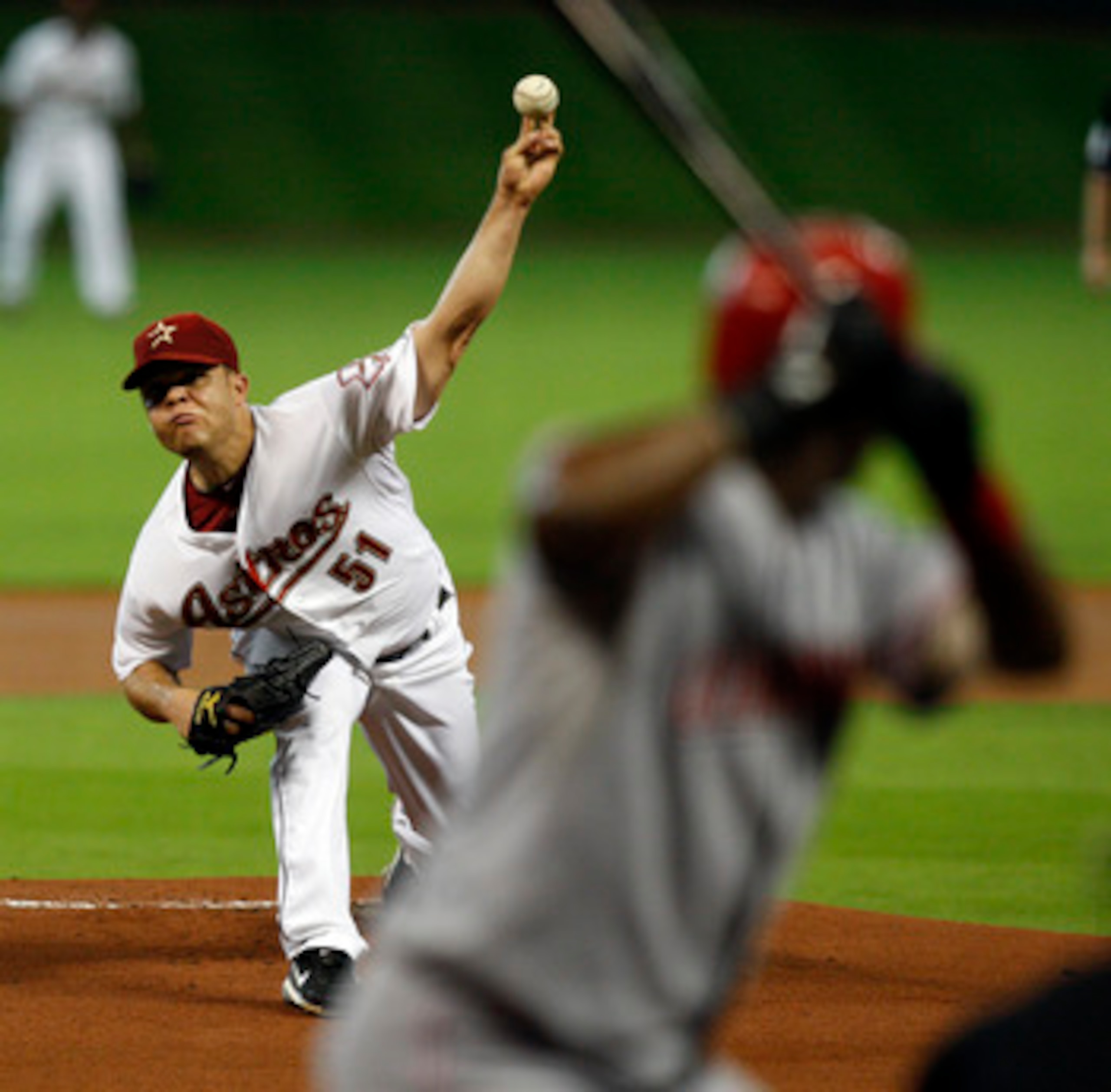 HOUSTON - MAY 11:  Pitcher Wandy Rodriguez #51 of the Houston Astros throws to Edgar Renteria of the Cincinnati Reds in the first inning at Minute Maid Park on May 11, 2011 in Houston, Texas.  (Photo by Bob Levey/Getty Images)