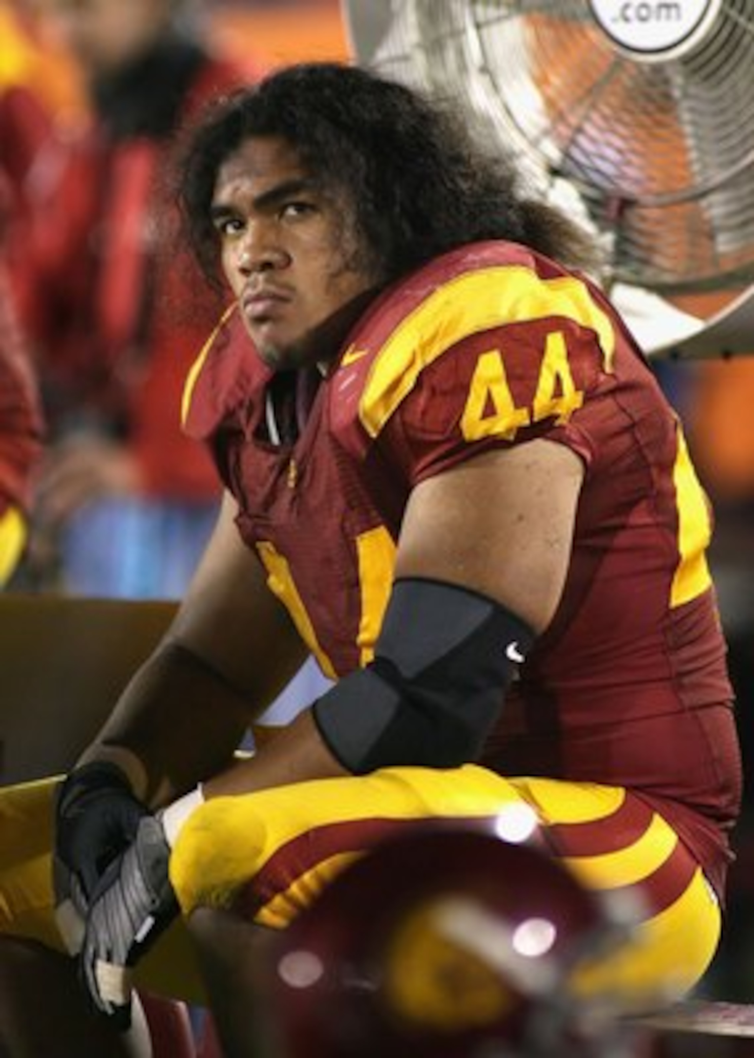 LOS ANGELES, CA - NOVEMBER 29:  Christian Tupou #44 of the USC Trojans sits on the bench during the game against the Notre Dame Fighting Irish at Los Angeles Memorial Coliseum on November 29, 2008 in Los Angeles, California. The Trojans defeated the Fight
